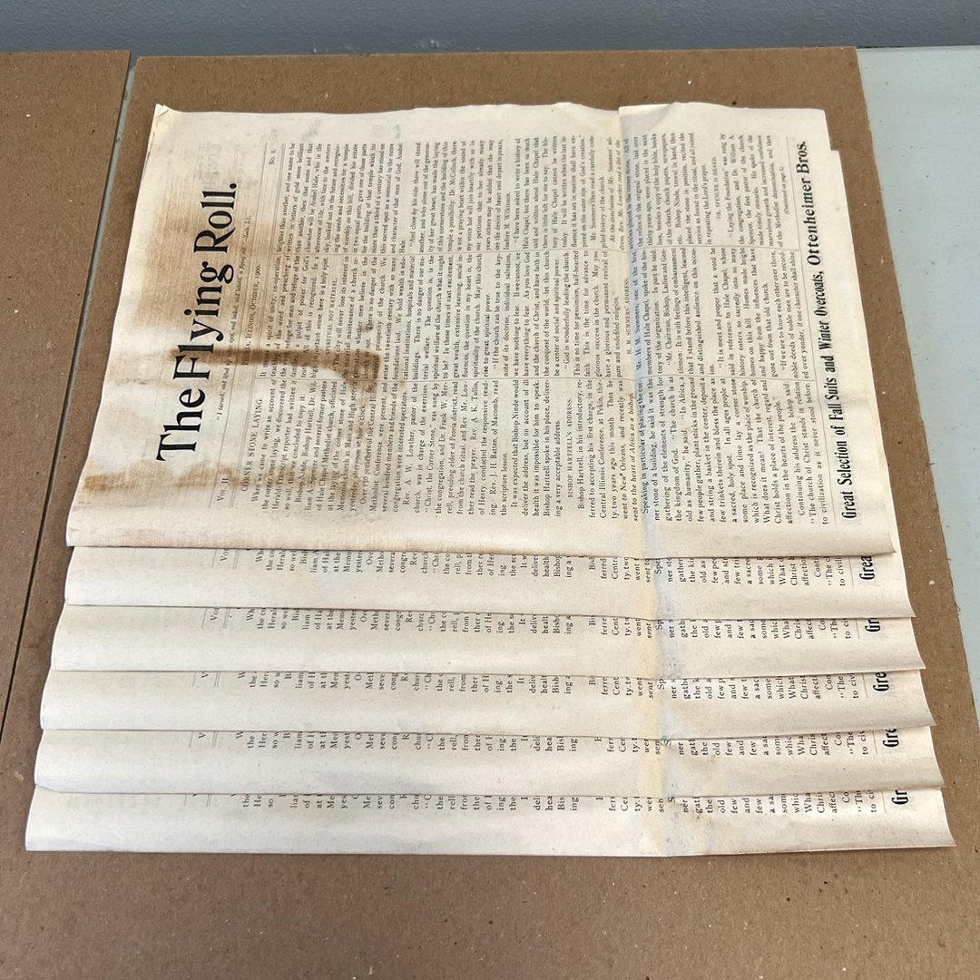 The dark spot on the front page of “The Flying Roll” is stained from where the “Holy Bible” sat.