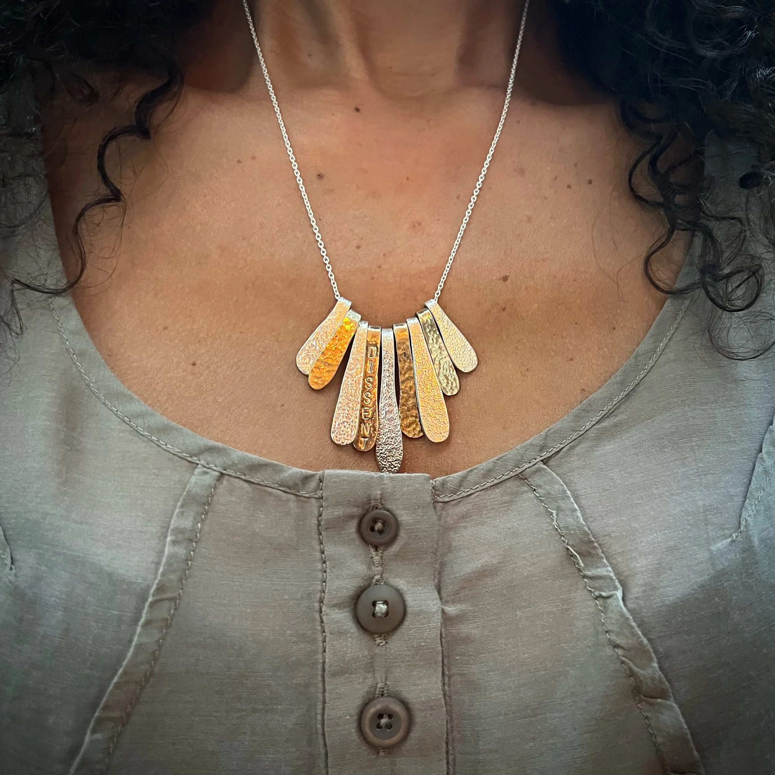 Dissent Necklace on neck.JPG