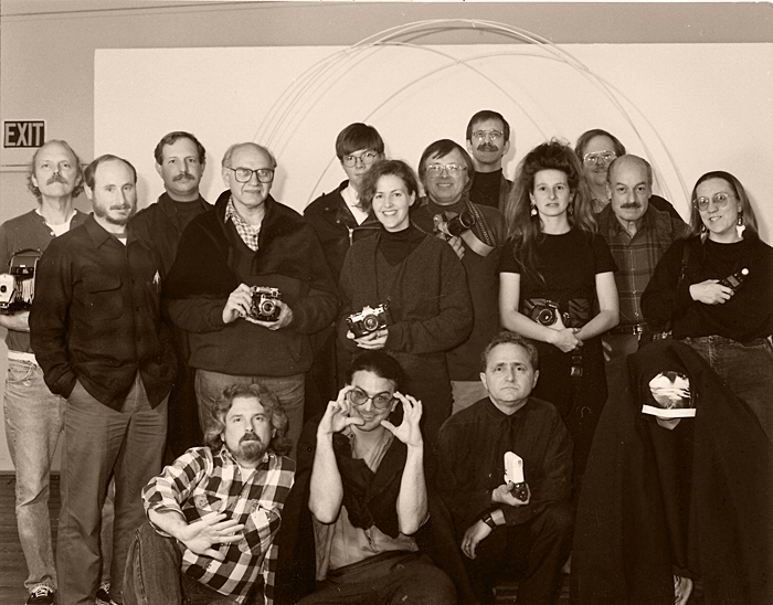 Portrait Night on High Street circa 1993. Front L-R: Guy Weese, Chris Johnson, Sal Milo, C.A. Burns Standing L-R: Cliff Minks, Gary Tepfer, Pat Plaia, Herman Krieger, ?,Nancy Orr, Bill Boslaugh, John Coggins, Christine Granger, Walt OBrien, Dave Ball, Deborah Weese.