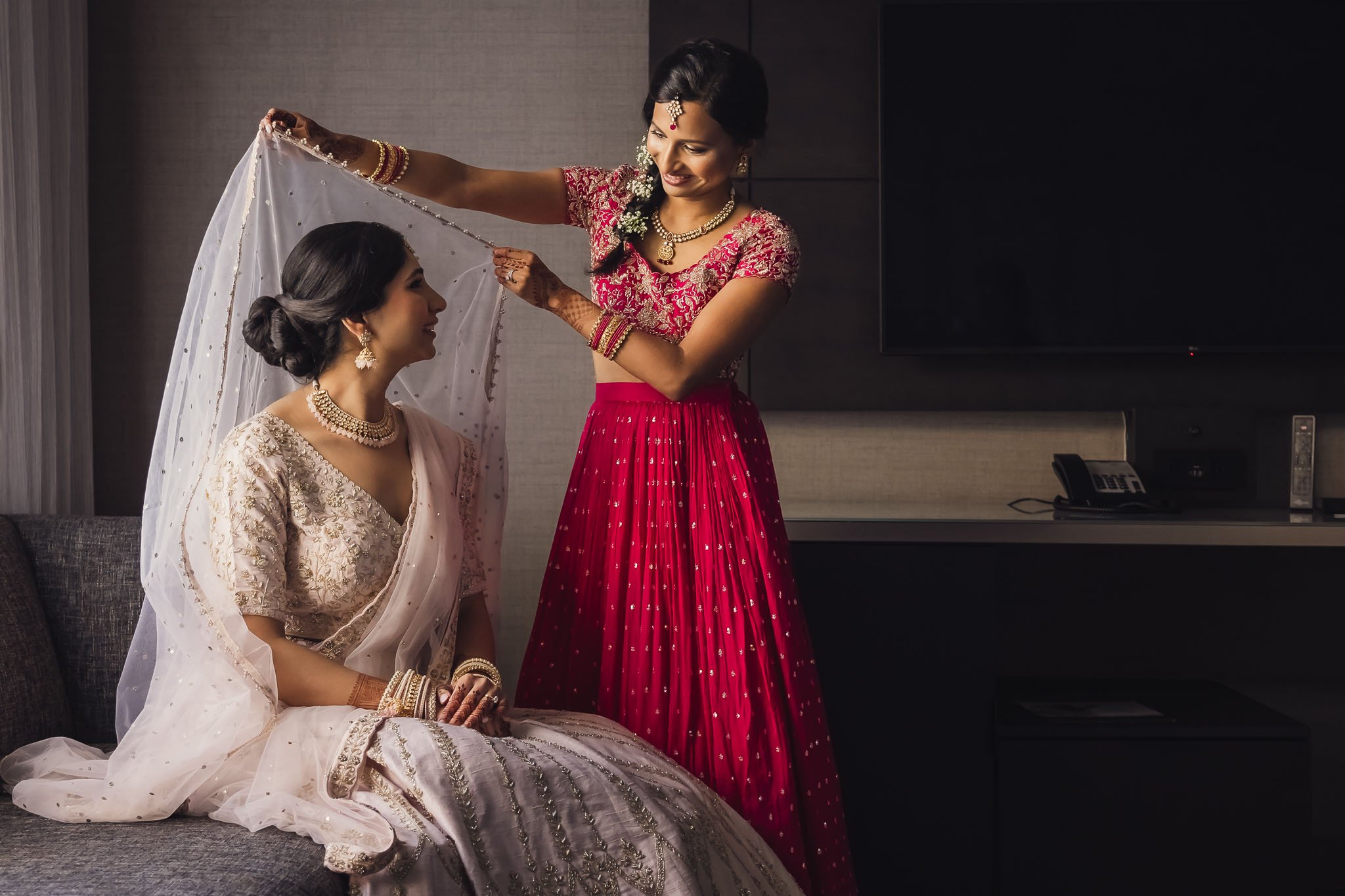 Putting a Dupatta on Indian bride