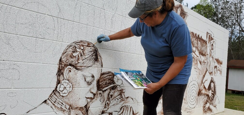  Artist Karen Harley works on the underpainting.  Photo courtesy of Karen Harley  