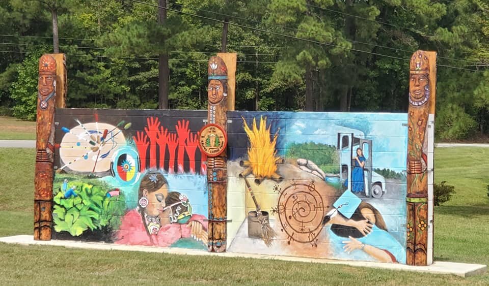  The completed mural and sculpture on the south-facing side of the wall.  Photo courtesy of Karen Harley  