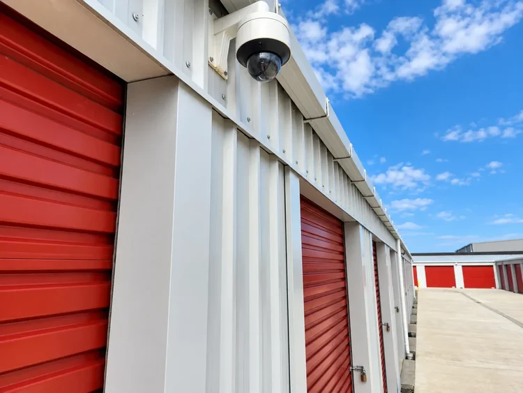 Dome CCTV camera mounted above the roller doors at Storage4Less Rolleston