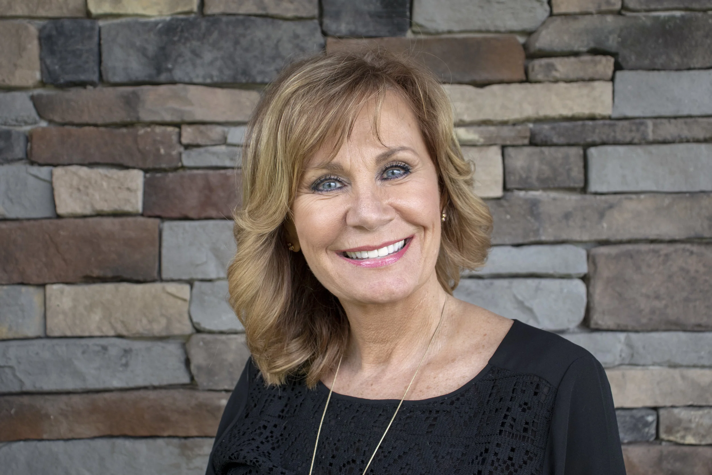 Debby Biddle|Owner, Master Stylist & Make up Artist