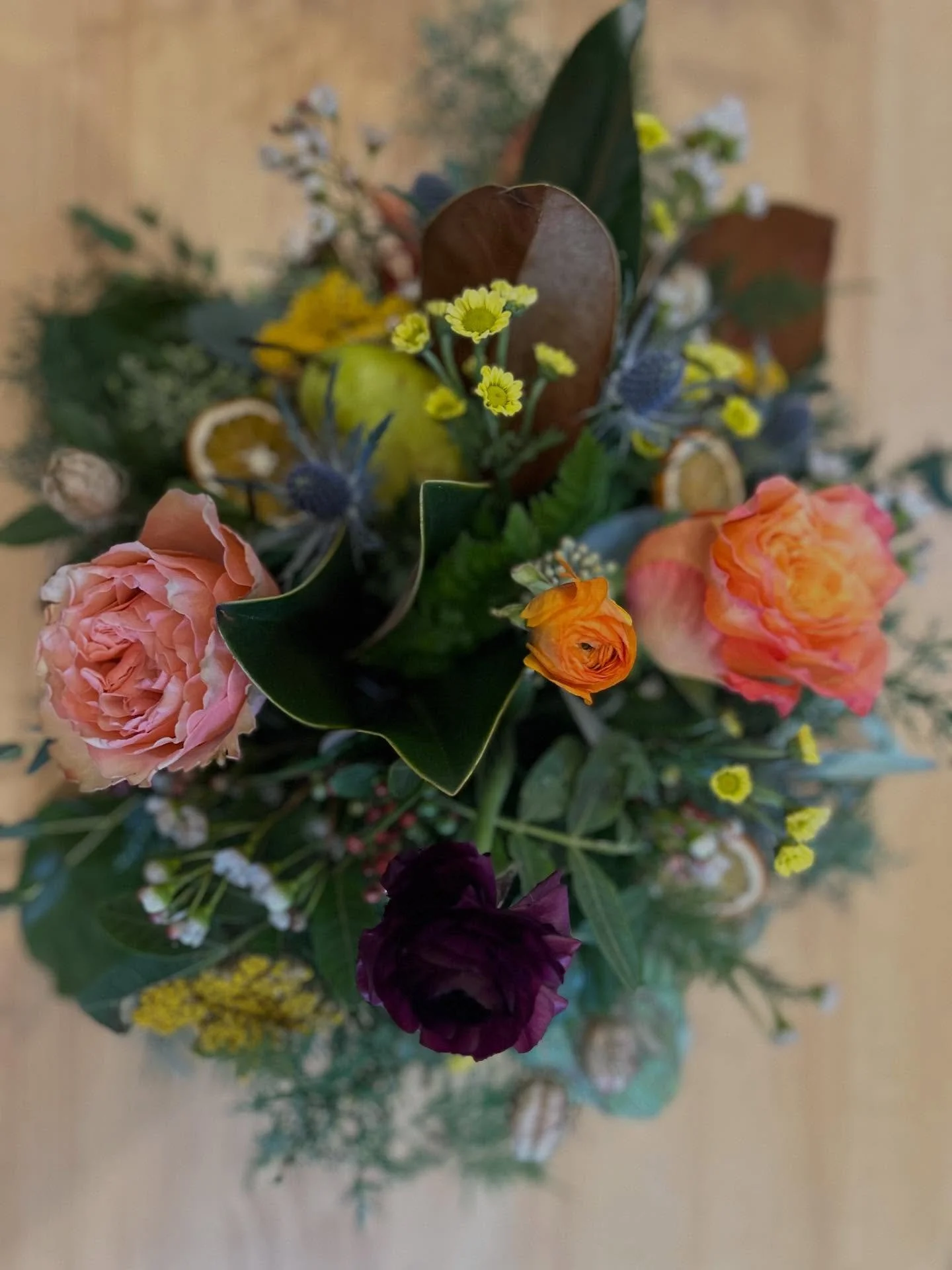 Need to top off your table? 
We are happy to assist with a custom floral centerpiece for you or for your hosts. &nbsp;Our arrangements come in multiple sizes and no two are exactly alike! We love to design with warm colors and lots of textures and a 