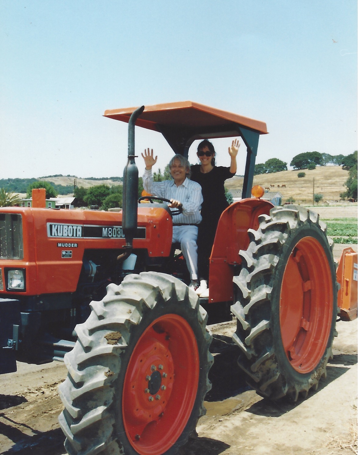 1980s—Mendek & Ruthie on tractor.jpeg