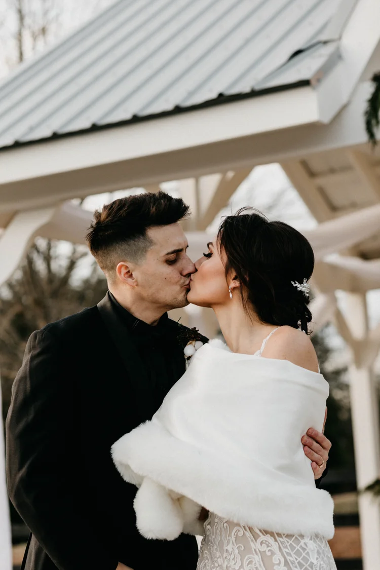 Bride and groom share a kiss, Georgia wedding photography by MYXD MEDIA