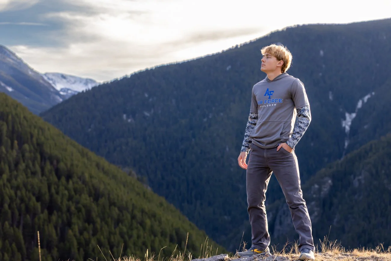 A Bozeman Senior Portrait on top of a mountain letting the world know, he is ready for the next challenge.