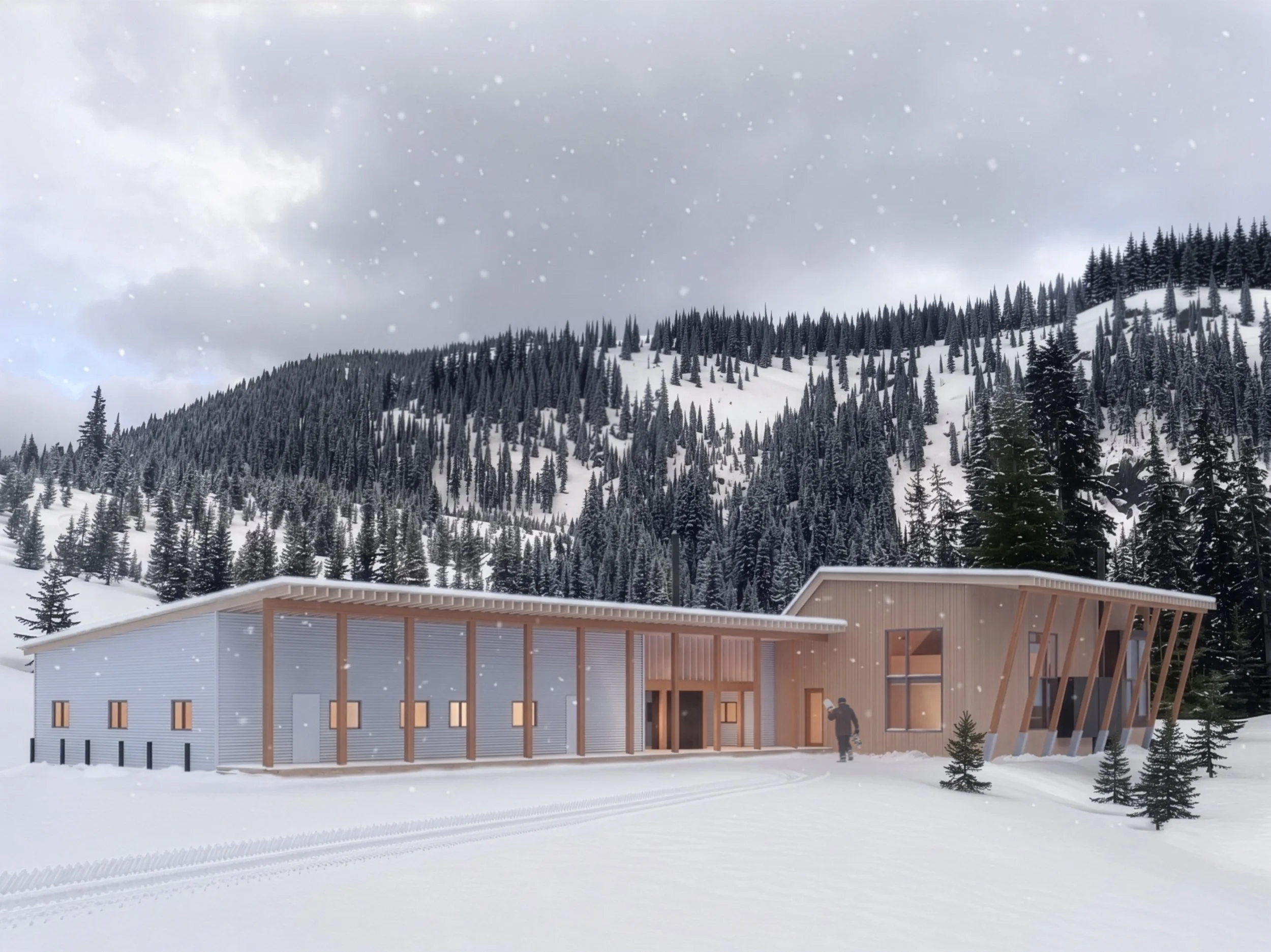 Modern building under construction in snowy landscape with forested mountain in background, cloudy sky, snow falling, and tire tracks in snow.