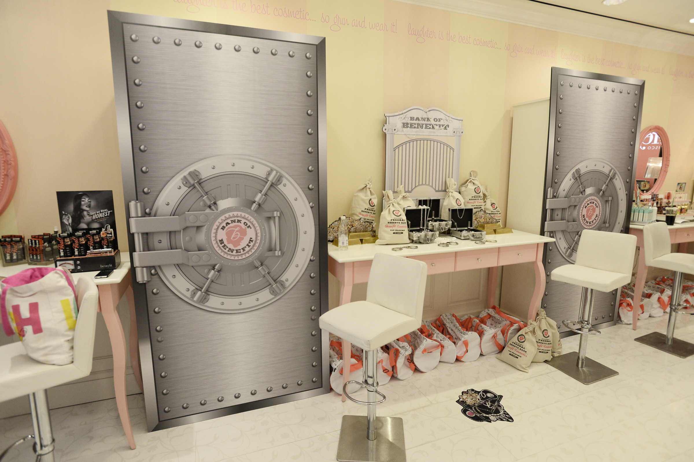  Table display of They’re Real products and Bank of Benefit vaults line the interior of the boutique. 