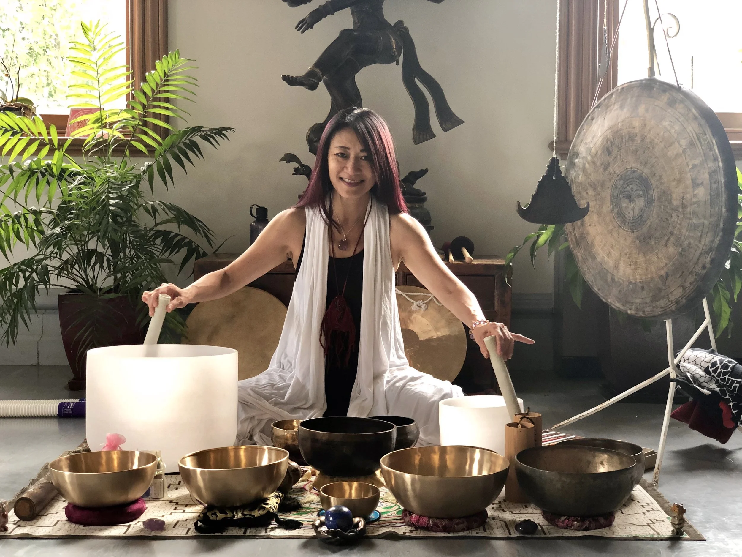 Abby Setting up for Sound Meditation at One Heart