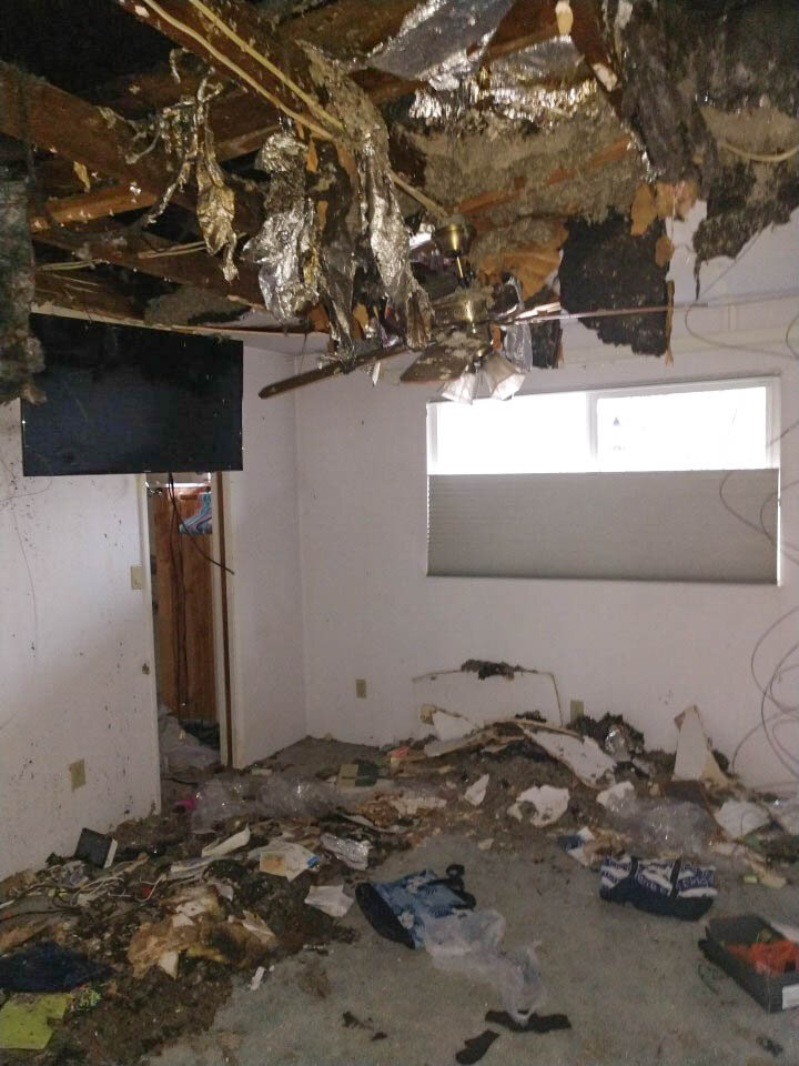 Fire spread throughout the roof and ceiling, launching a clean-up strategy  that included surgical demolition, removal of fire damaged areas, smoke removal, and pack-out of salvageable belongings.