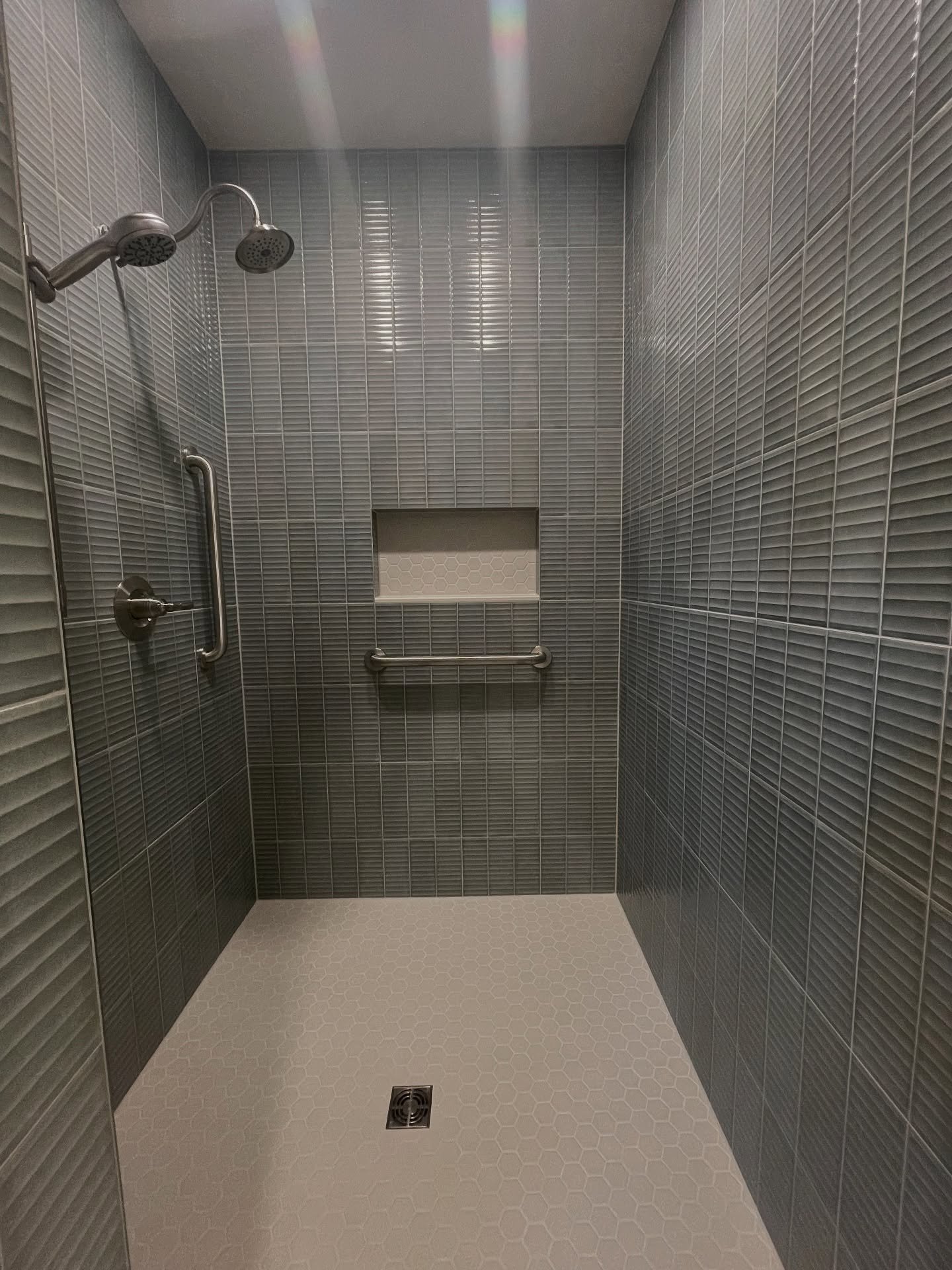 From outdated, to a modern and easily accessible shower, we completely remodeled this master bath. ➡️ Swipe for before photos!