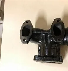 TX17229 - EXHAUST MANIFOLD - L.H. - FOR LONG TRACTORS