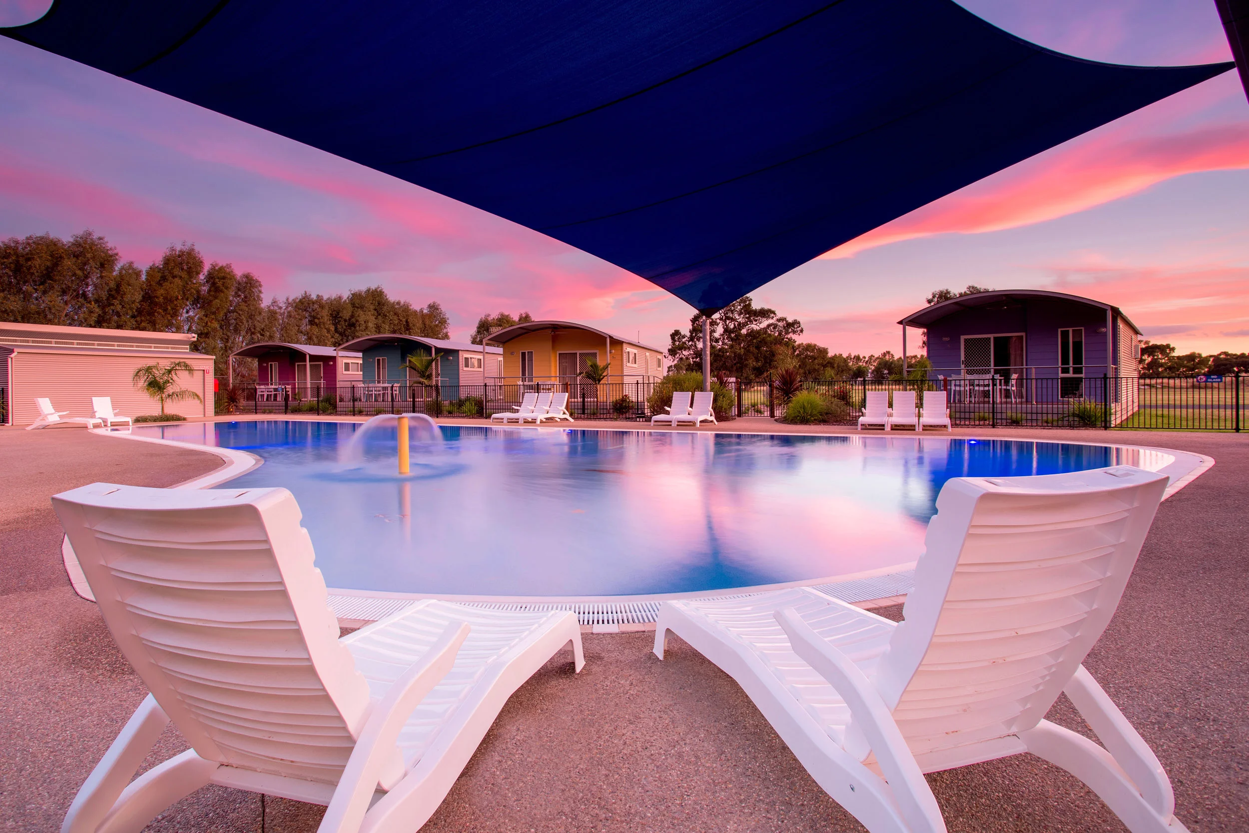 poolside-at-dusk-holiday-park-resort-photography.jpg