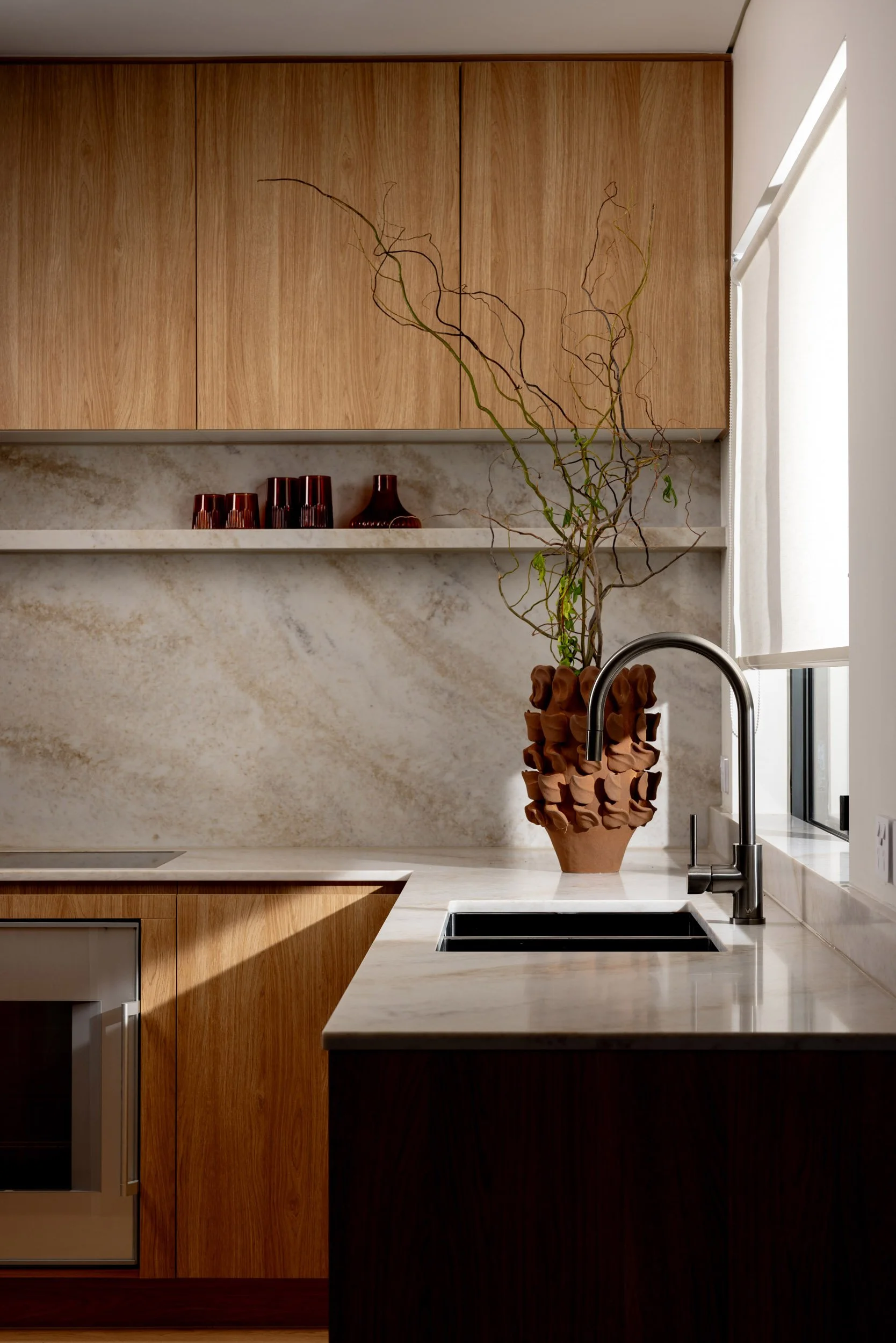 Custom timber kitchen cabinetry and stone benchtop detail photographed for a Peregian Springs interior design project