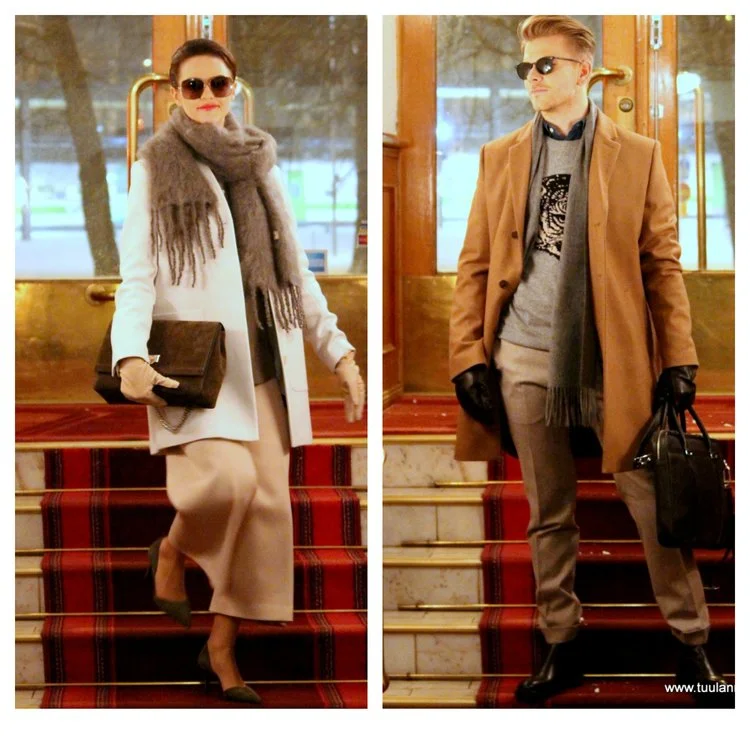 She in Filippa K coat & trousers & shirt & gloves, Decadent bag, Balmuir scarf, By Malene Birger shoes. He in Tiger of Sweden coat & knit & shirt & gloves & bag & shoes, Oscar Jacobson trousers, Balmuir scarf