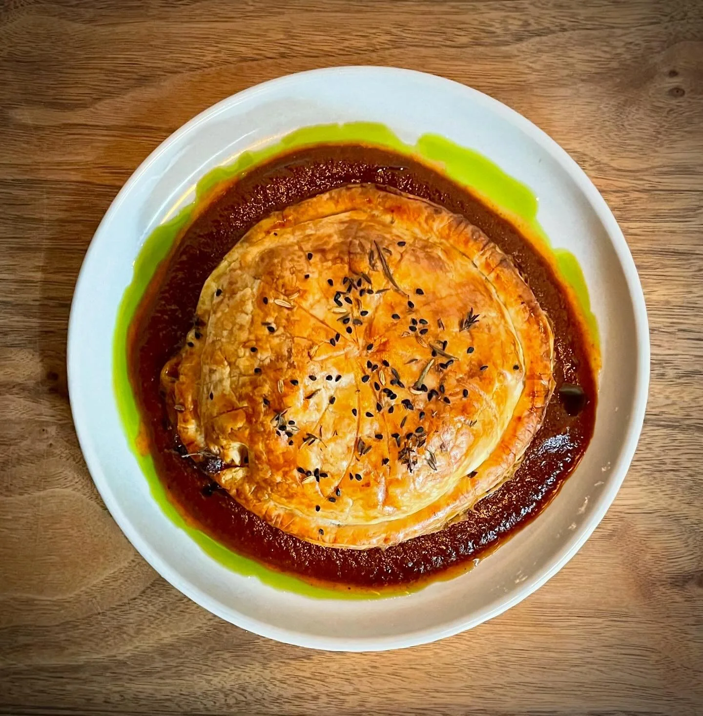 Rainy mid week evenings were made for this. Good company, warm cosy corners, big comfy chairs, a banging glass of wine and a kick ass pie. 

This little baby will be on the specials tonight, but is likely to sell out quick. Braised lamb shoulder pith