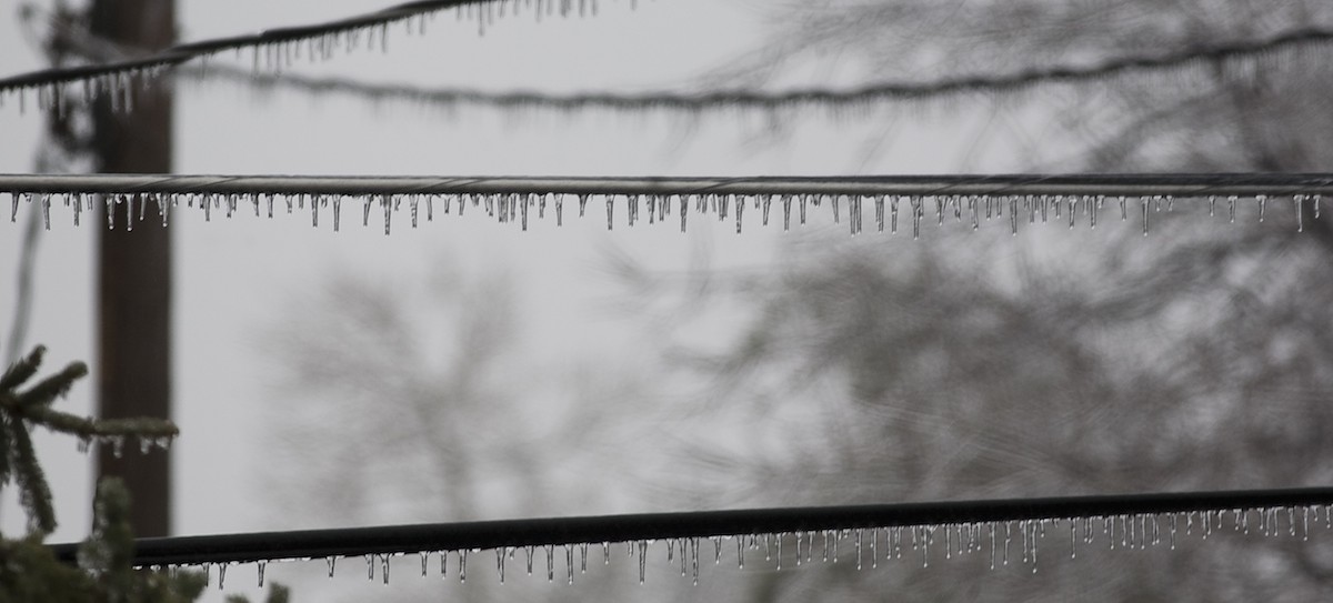 stock-photo-icy-power-lines-after-an-ice-storm-in-northern-minnesota-28144297-e1398189669946.jpg