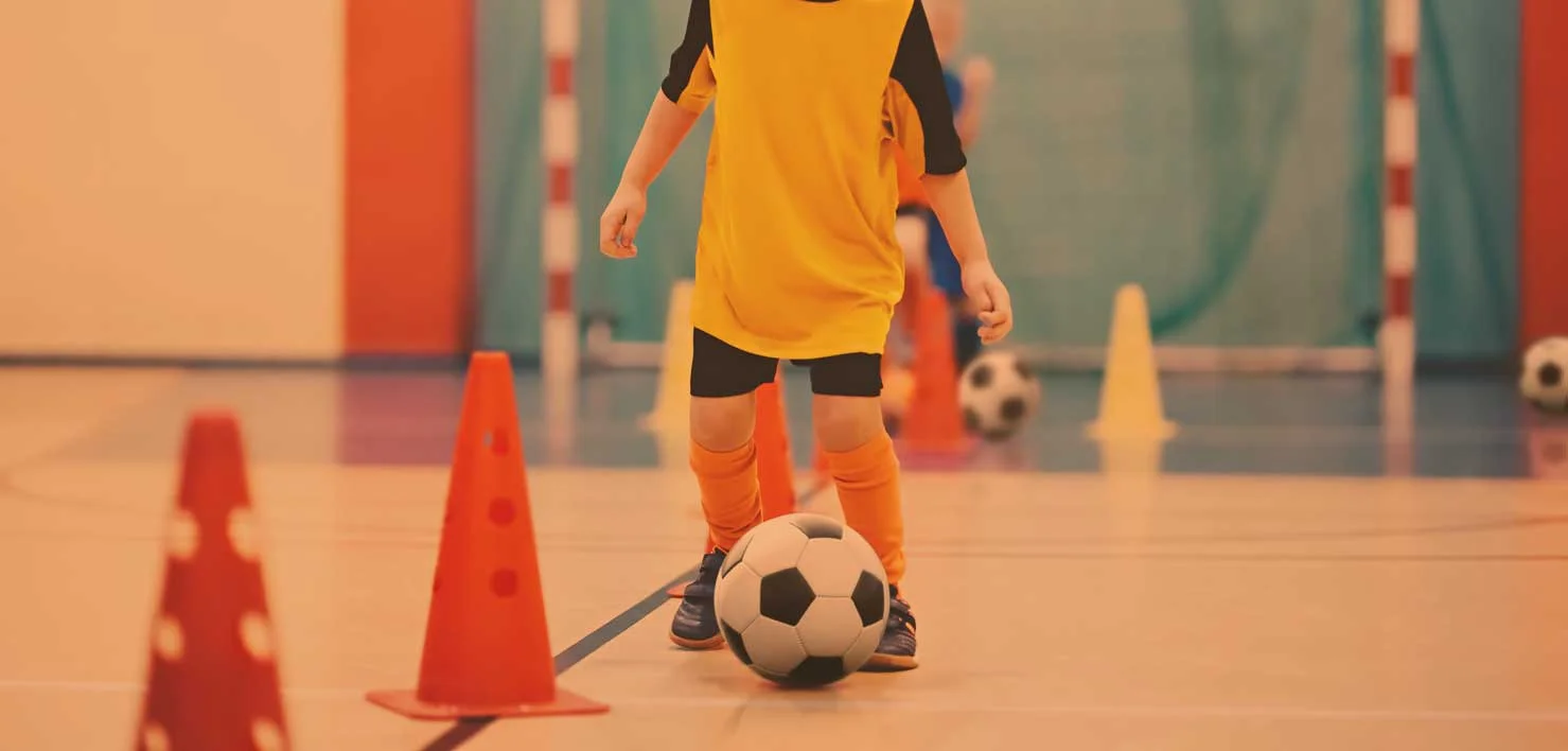 boy-playing-soccer-ymca.jpg