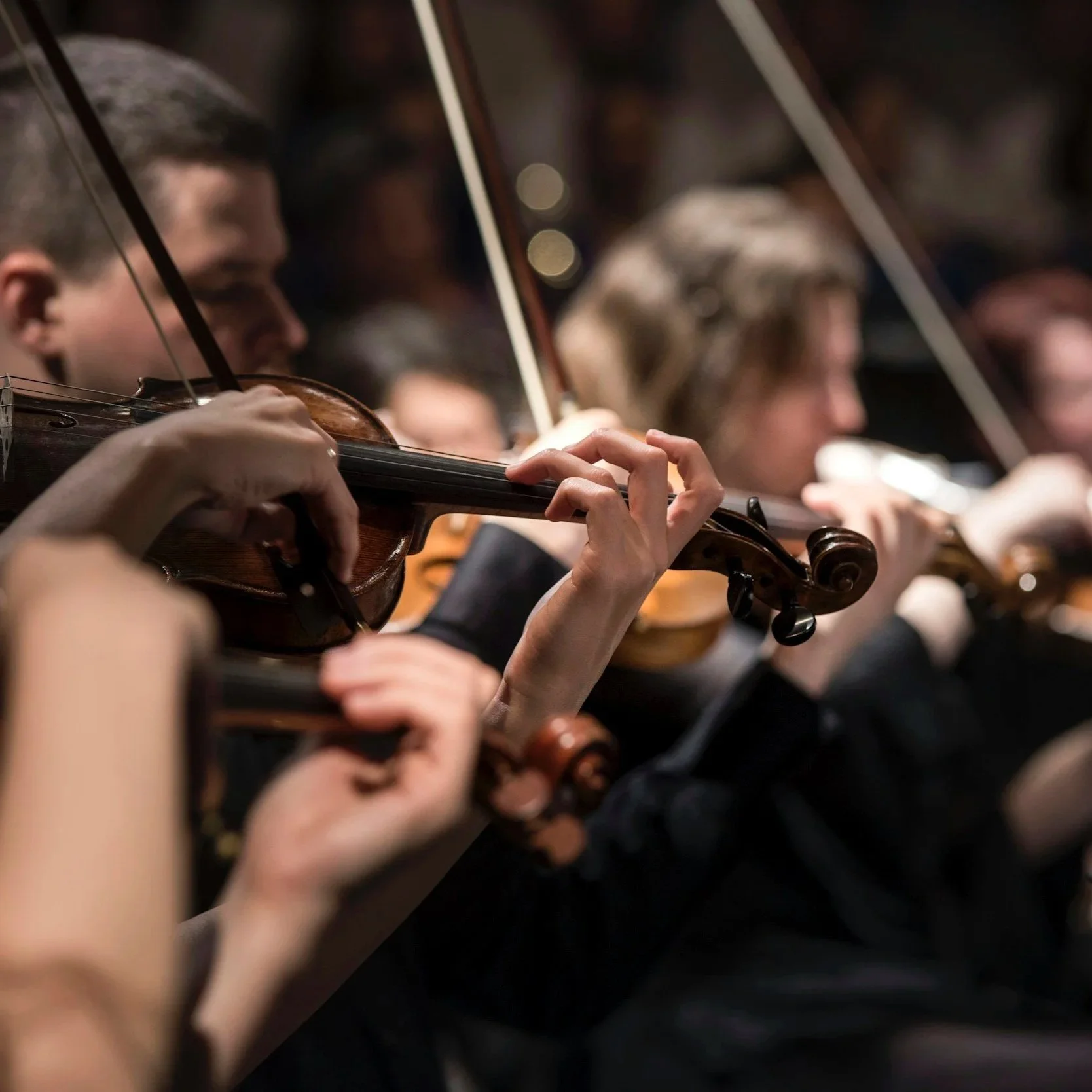 Image of musicians playing violin