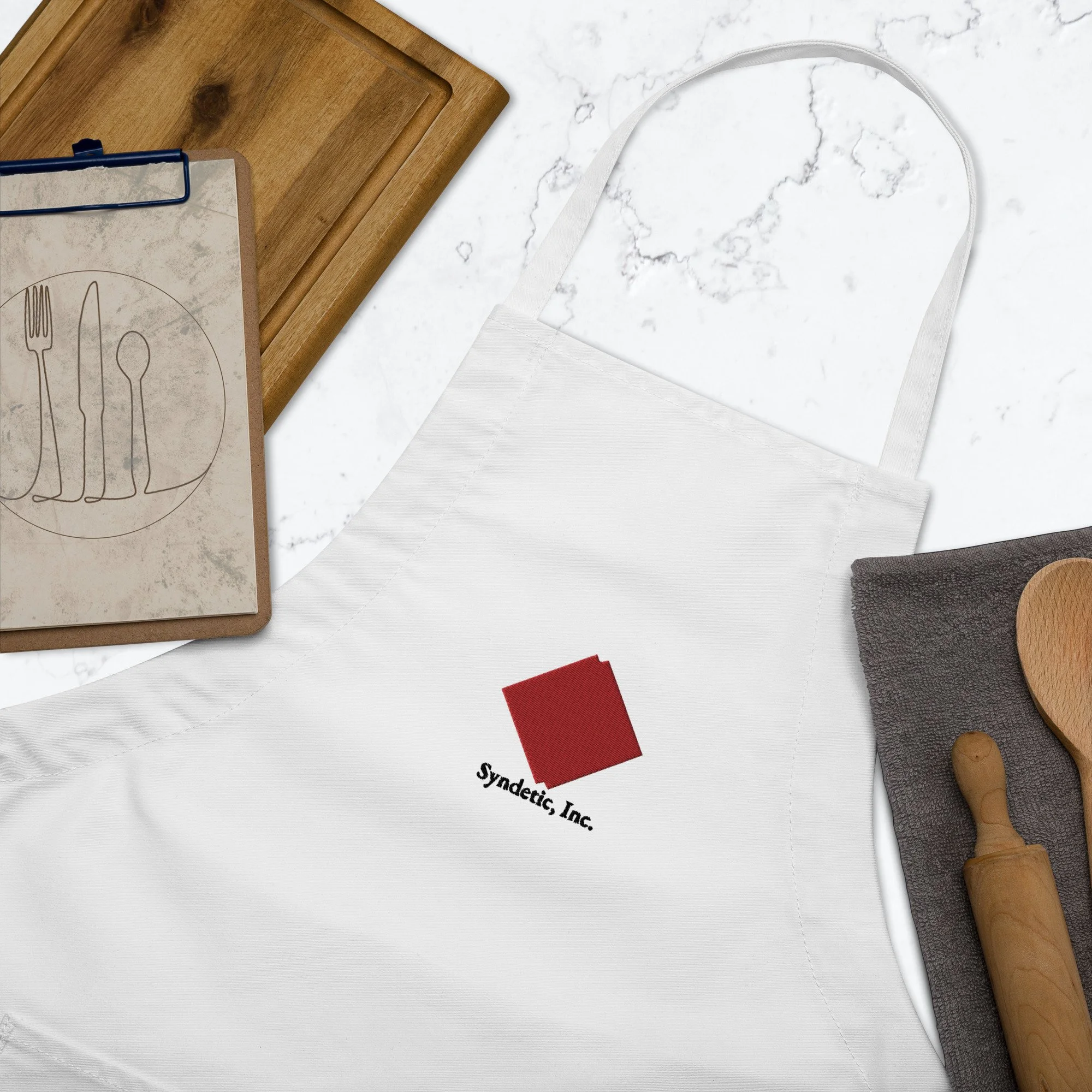 embroidered-apron-white-zoomed-in-635bf5d034942.jpg