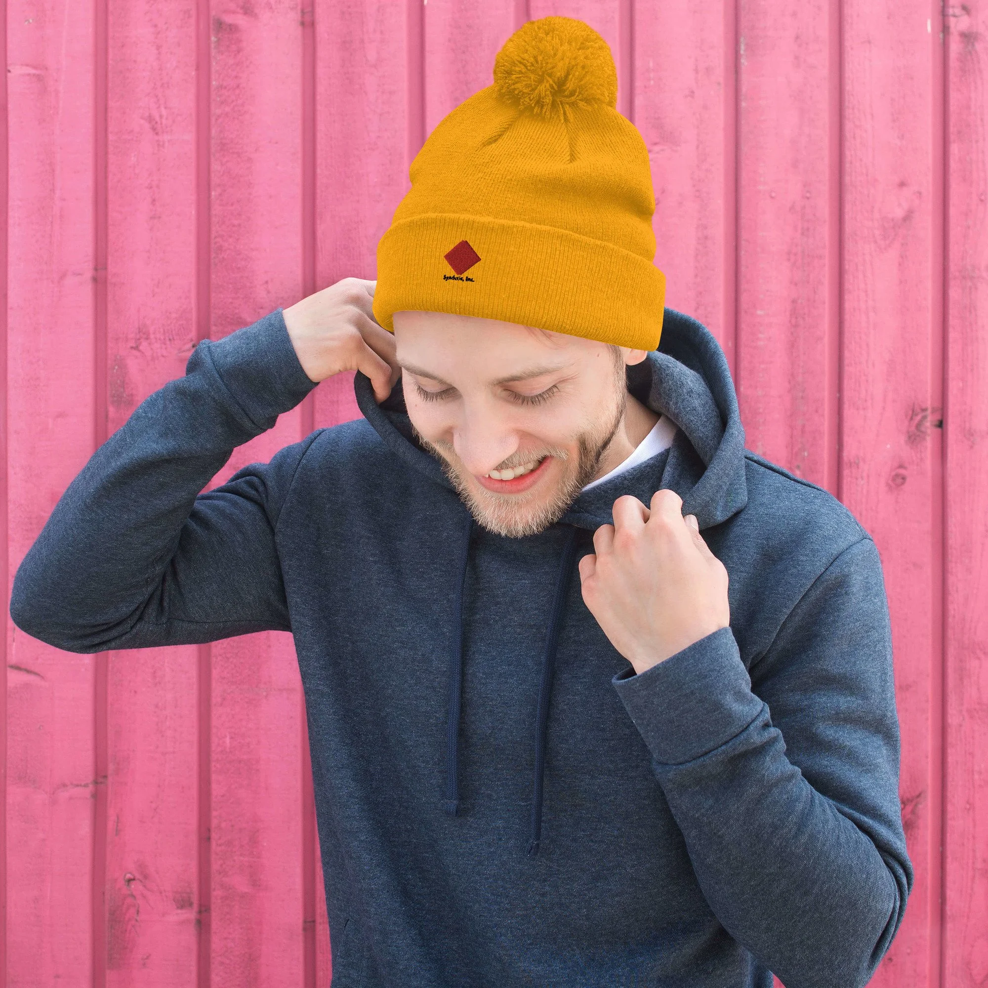 pom-pom-knit-cap-gold-front-636157bb4faca.jpg