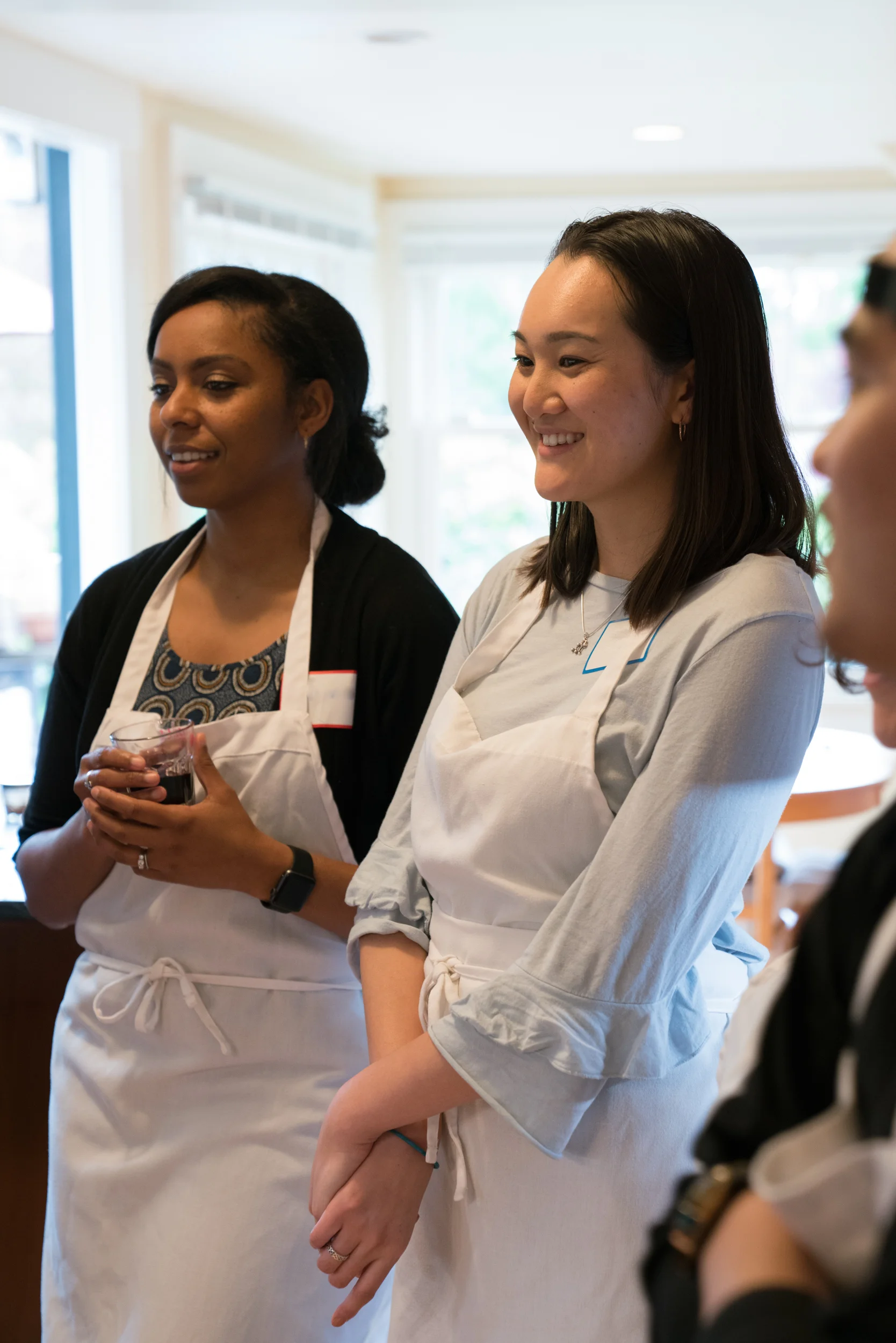 Cook-with-Chef-Traci-Team-Building-Member-Smiling-in-kitchen.jpg