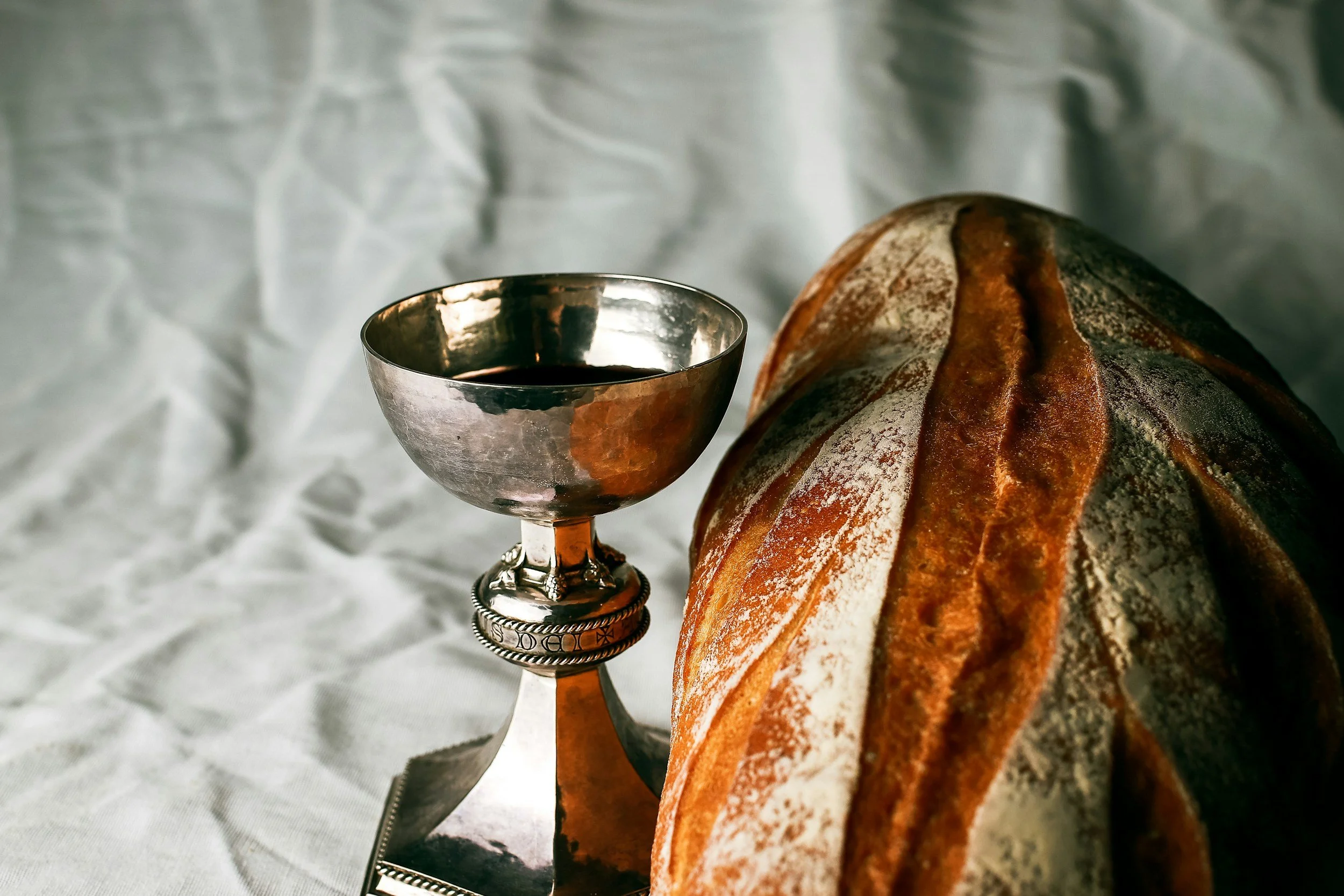 Bread and chalice representing First Communion journal gifts.