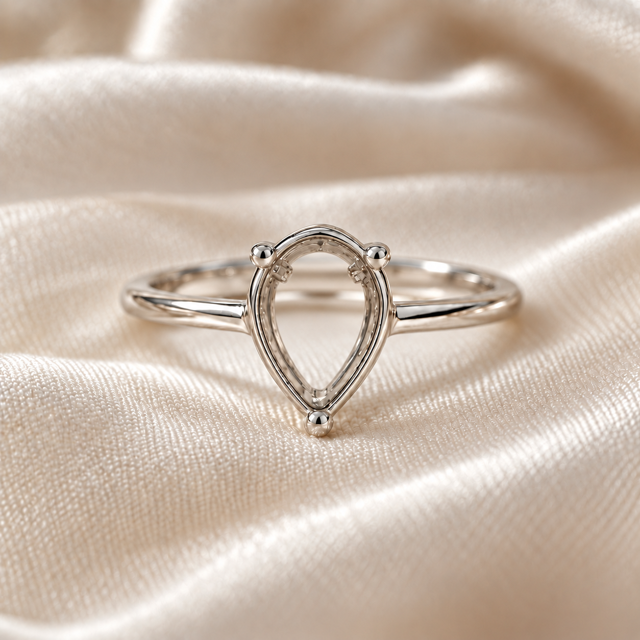 Pear Solitaire Keepsake Ring