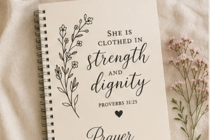 Personalized spiral prayer journal featuring Proverbs 31:25.