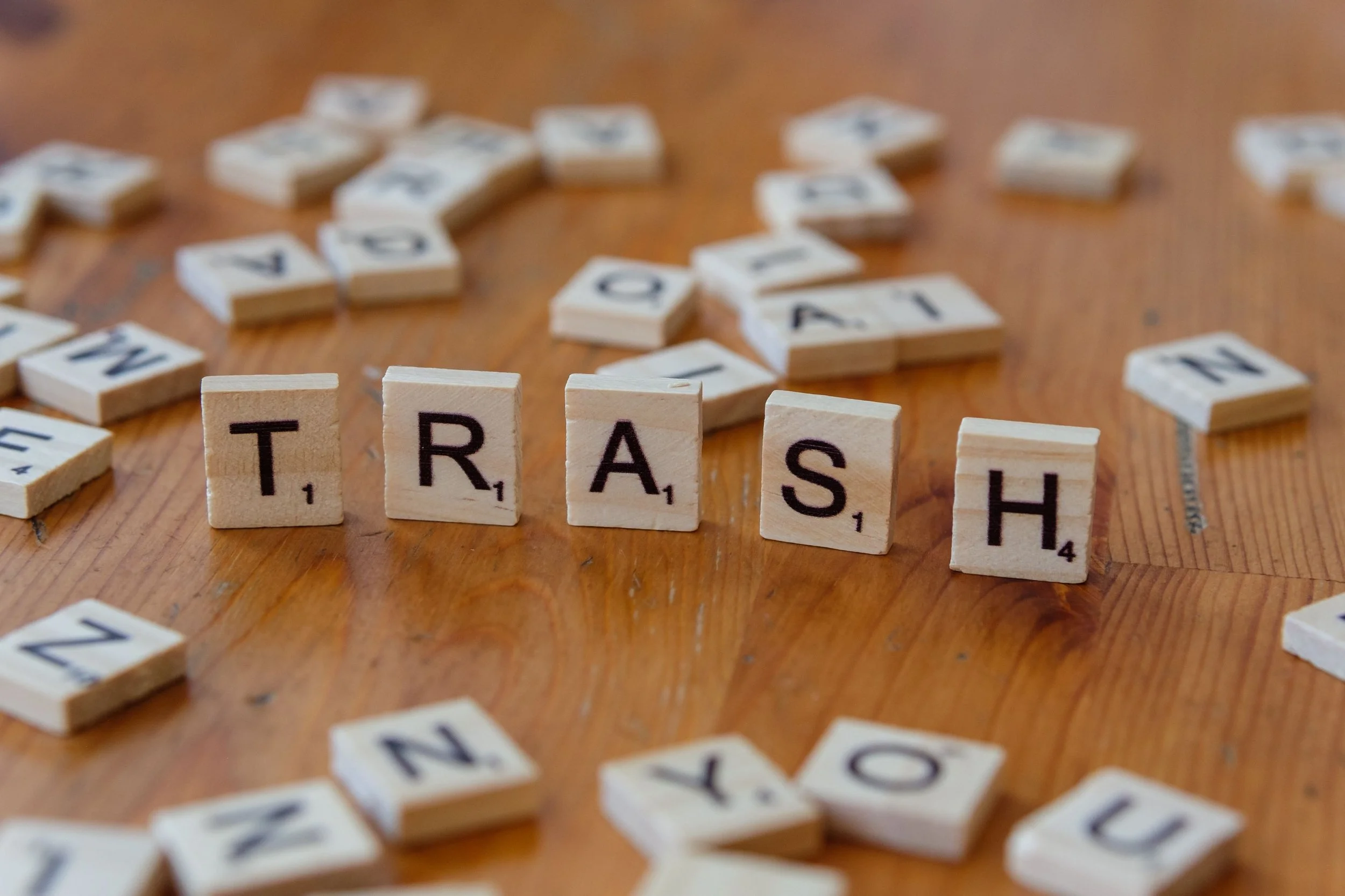 Letter tiles spell trash