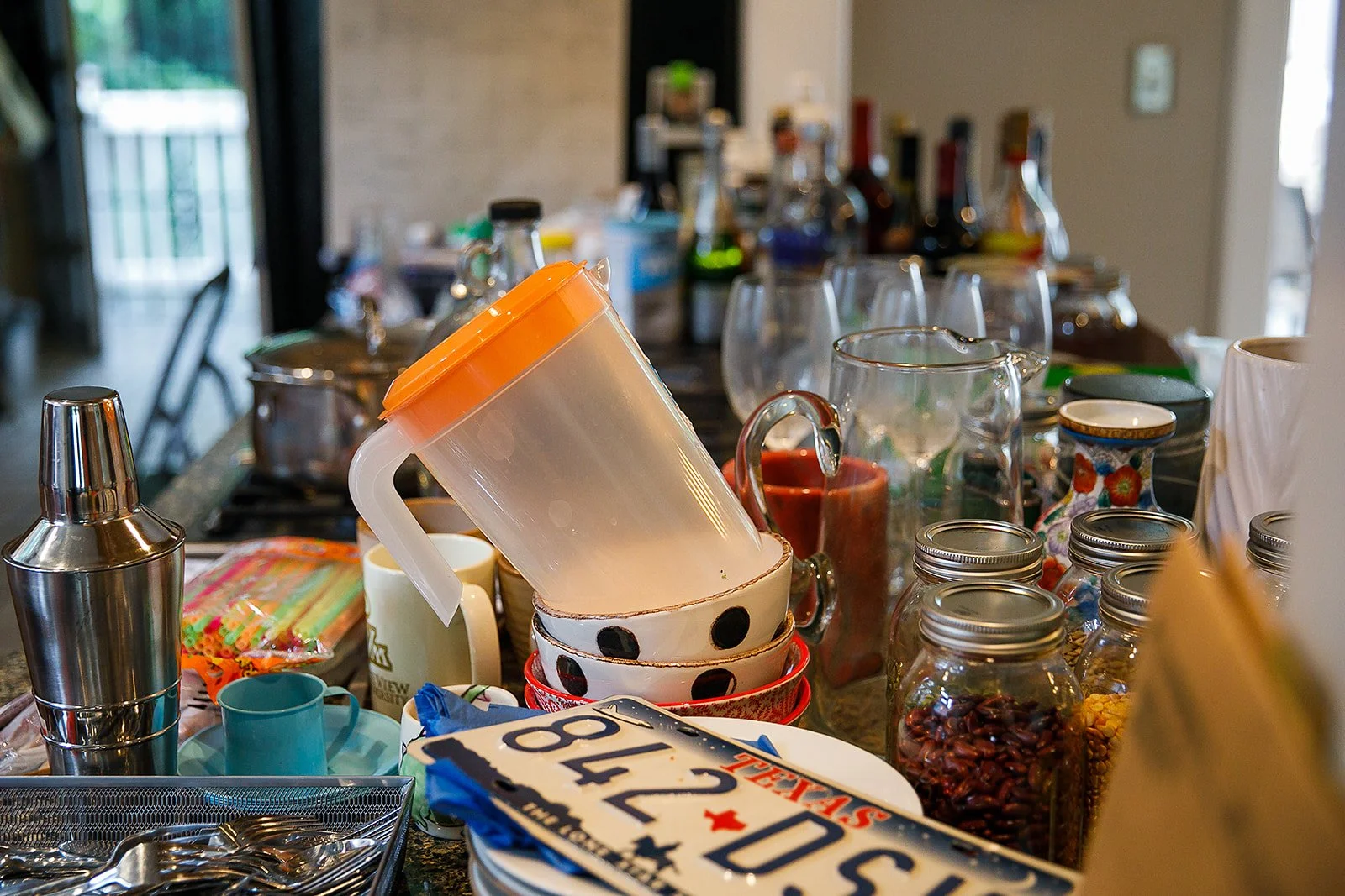 kitchen items on counter, glasses, plates, and more