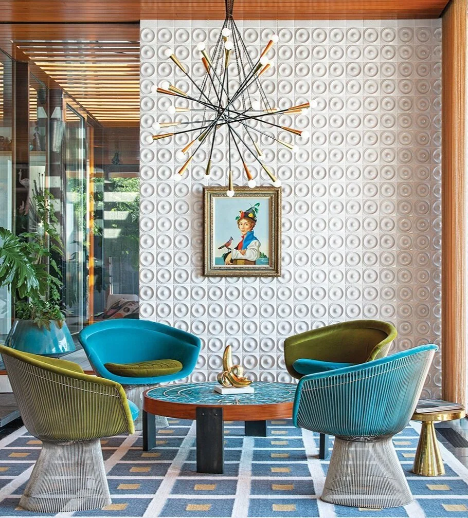Image Via Dwell Magazine by Jonathan AdlerGold, black and silver co-exist as additional colors in this stunning living space.
