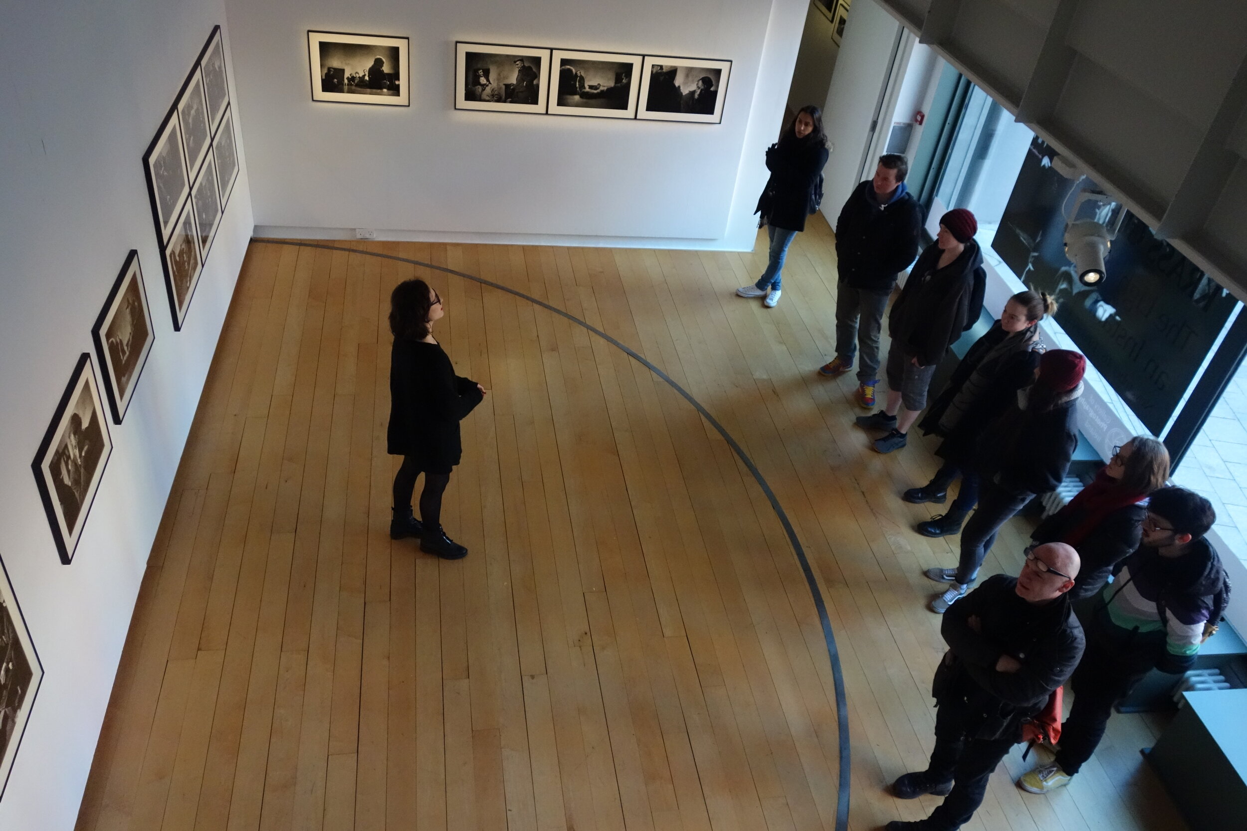  Julia giving a tour of the exhibition 