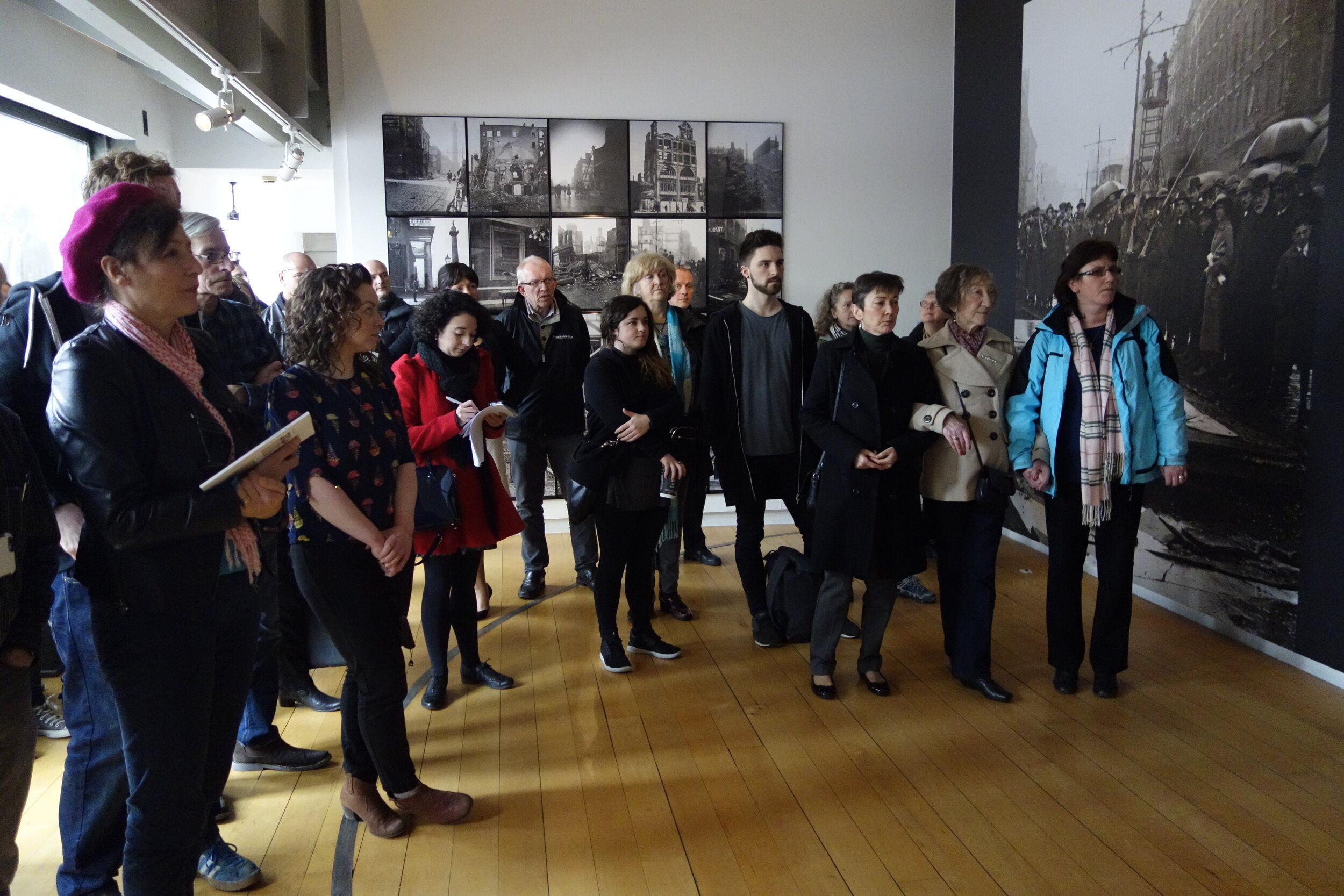  Curator Tanya Kiang (left) and the crowd at the opening of the exhibition 