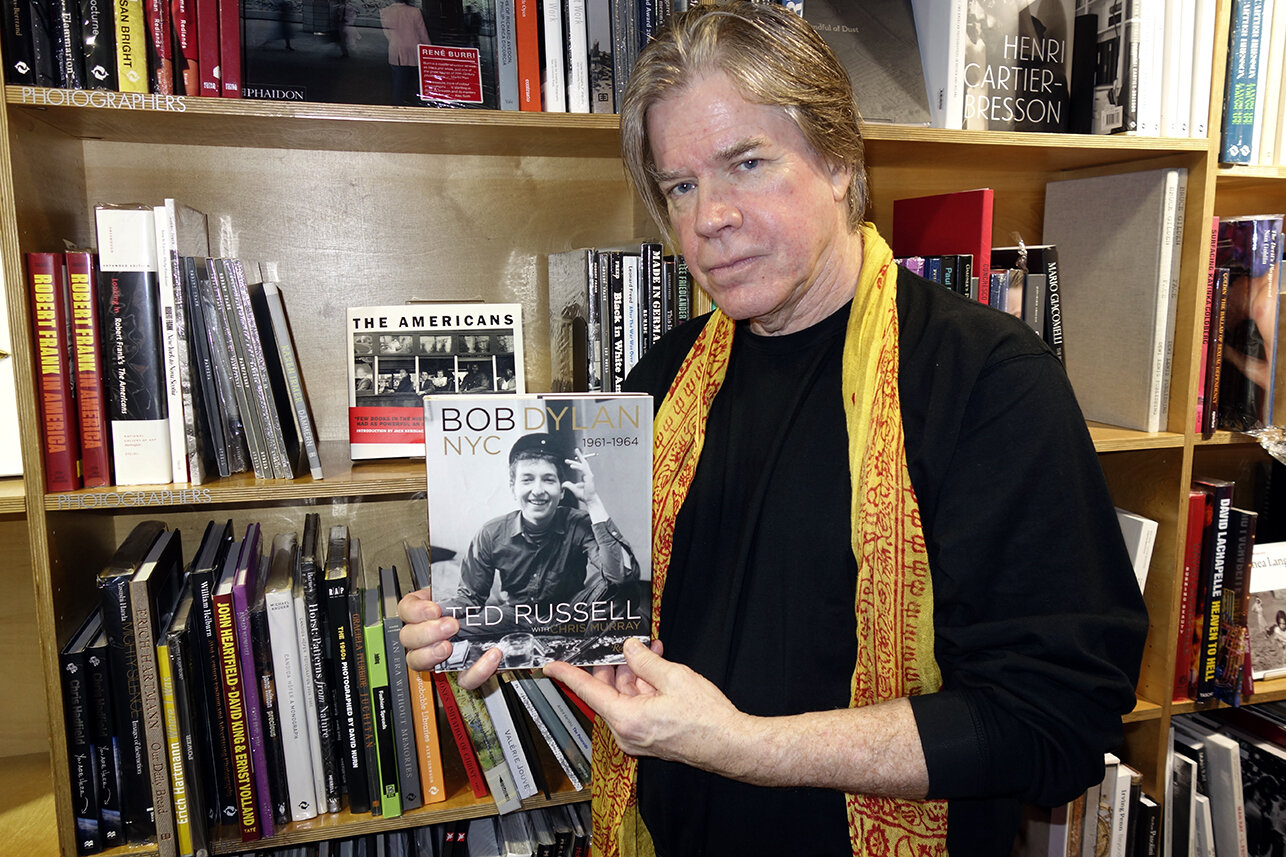  Curator Chris Murray with his book on Bob Dylan 