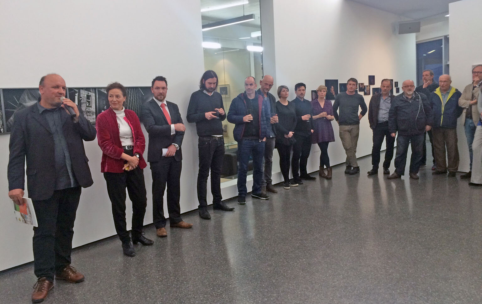  FOTOHOF Curator Herman Seidl (speaking), GOP Curator Tanya Kiang and the photographers featured in the exhibition at the opening in Salzburg 