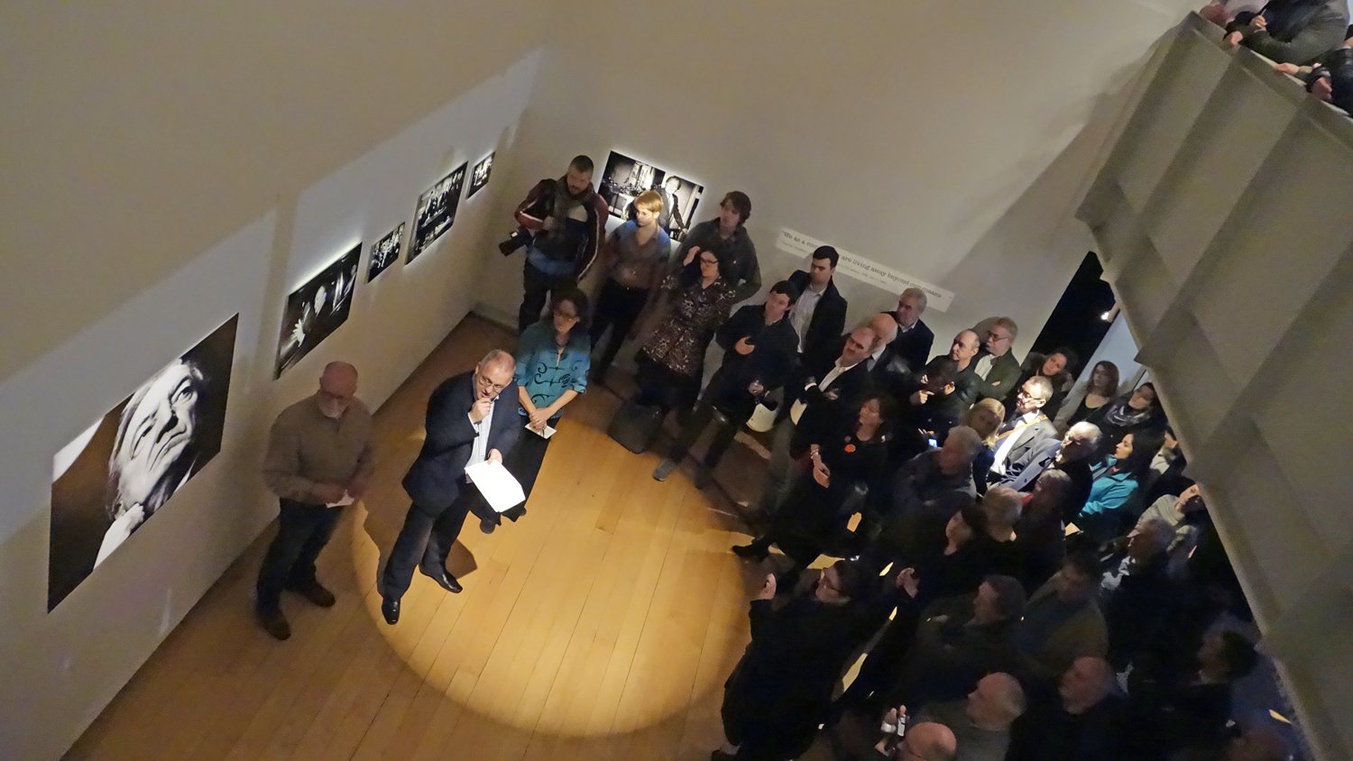  Prof. Kevin Rafter (speaking) with Photographer Eamonn Farrell and Curator Tanya Kiang on Opening Night 