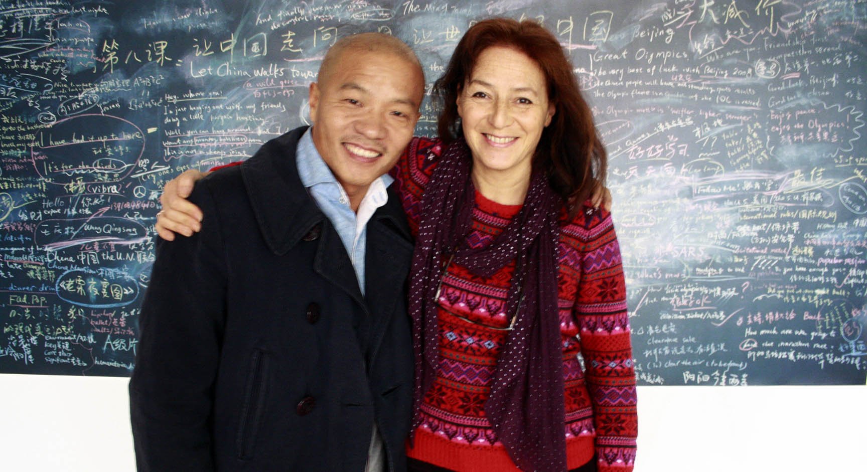  Photographer Wang Qingsong with Curator Tanya Kiang  