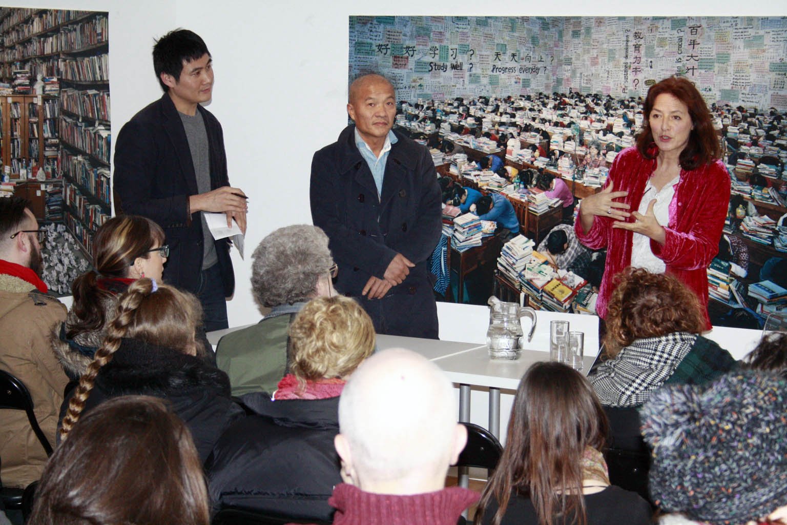  Photographer Wang Qingsong with Curator Tanya Kiang at the exhibition 