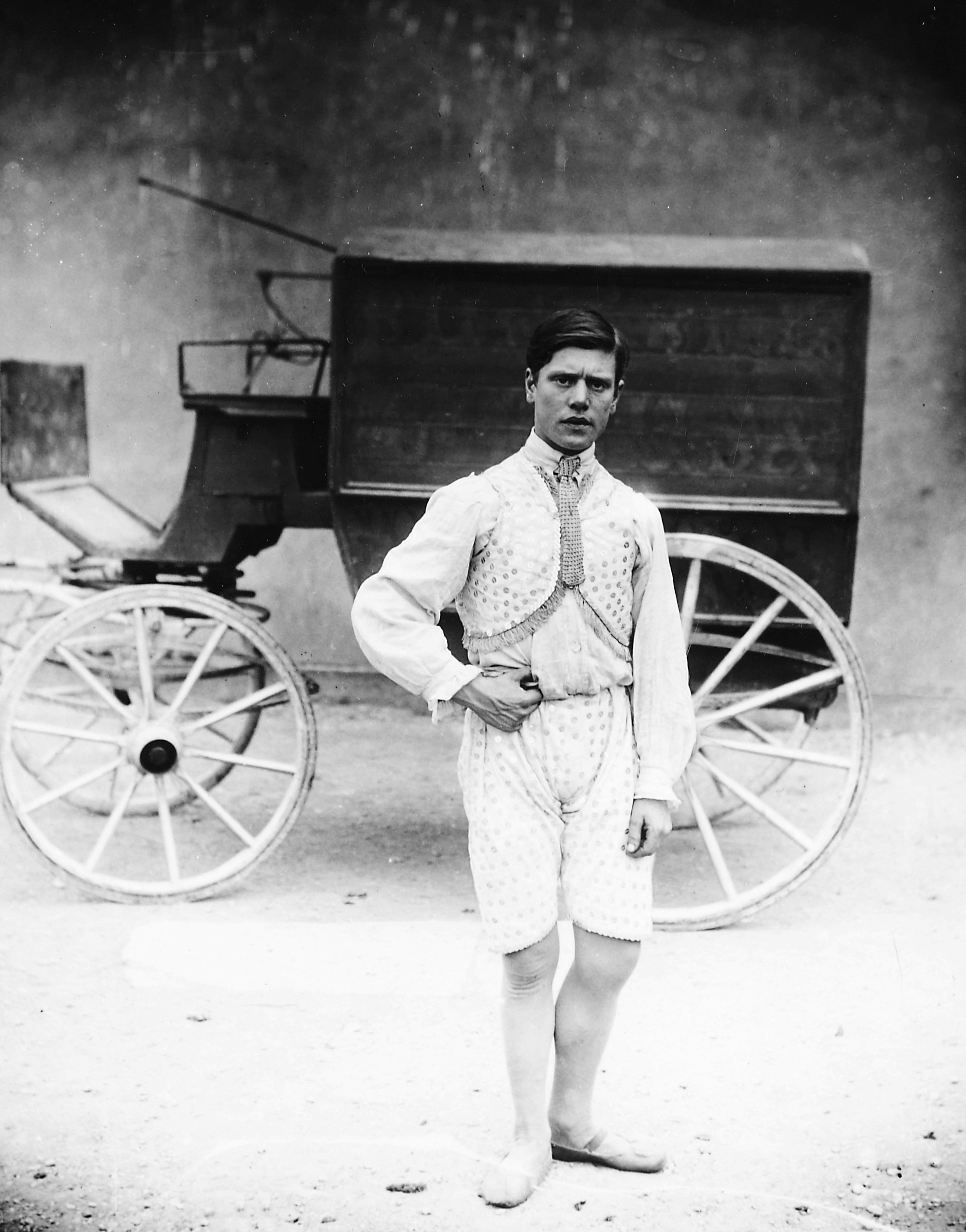 A circus performer in front of a wagon,&nbsp;c.1910 © (Copy)