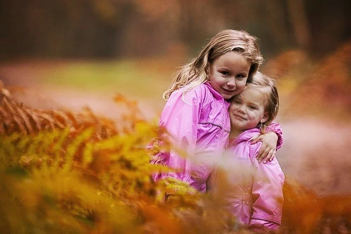A wet autumn day walk with my girls. #autumncolors #familyphotography #portraitphotography #sonya7iii #sonyportrait #sigma135mmart