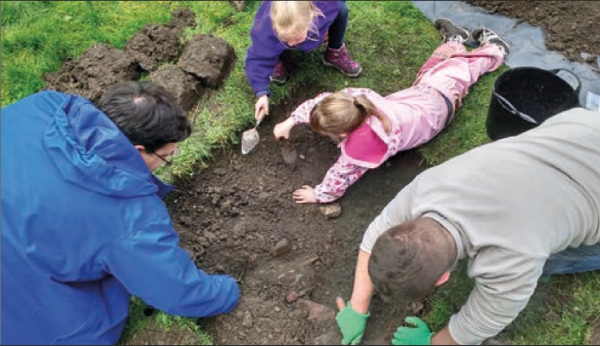 Children taking part in an archaeological excavation activity at Annet House, former home of Linlithgow Museum