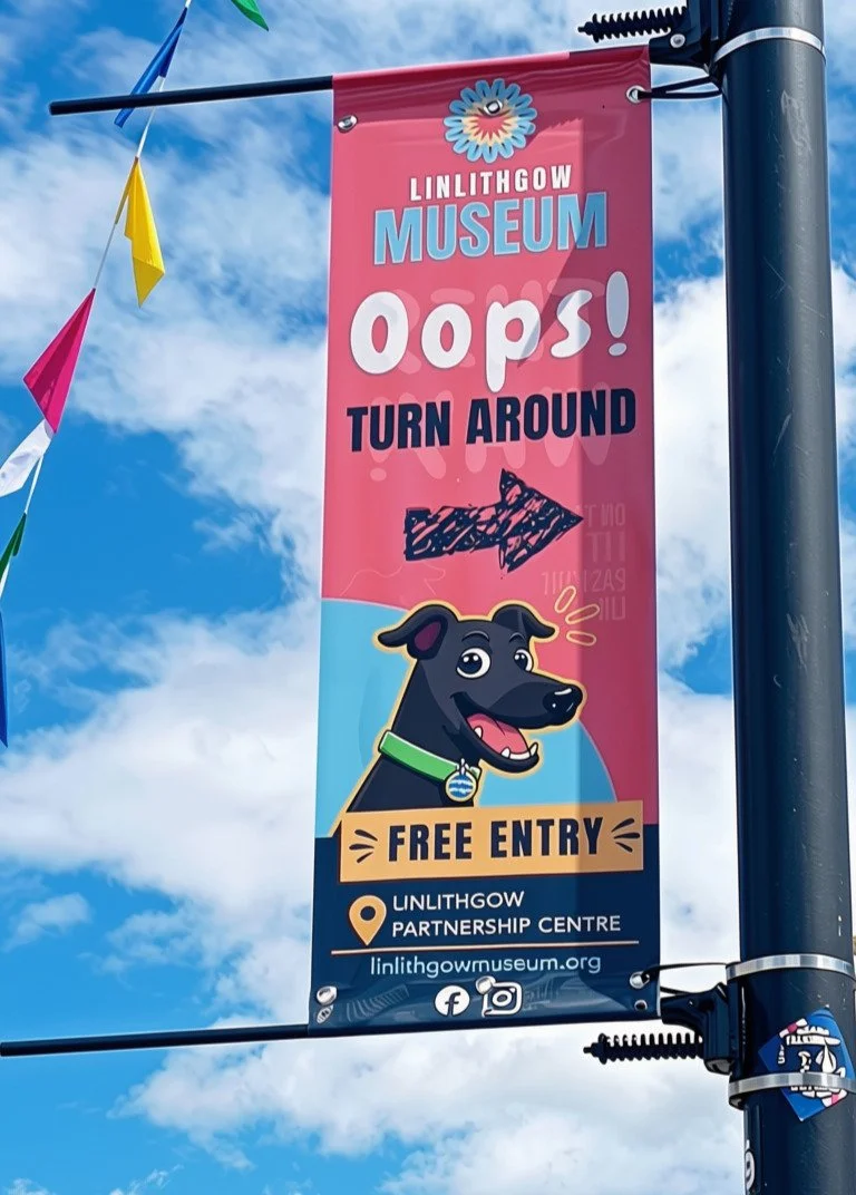 Museum banner on lamppost to help visitors find their way
