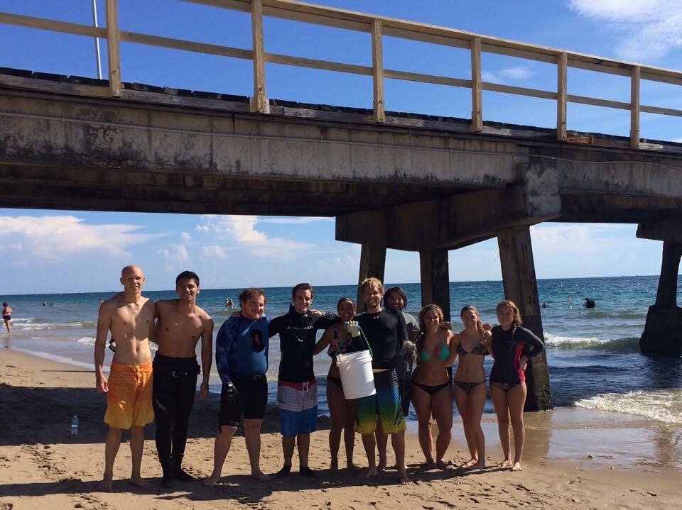 Cleaning up trash and debris underneath the Anglins Pier with the FAU Freediving Club