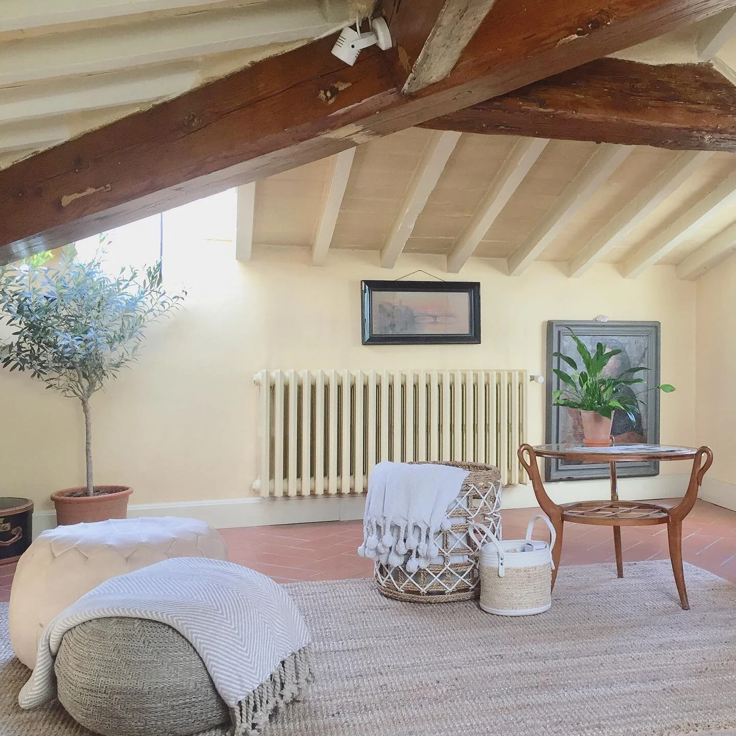 The sunny Tuscan living room is coming along! Work in progress, need more lounging cushions and olive trees... 😊