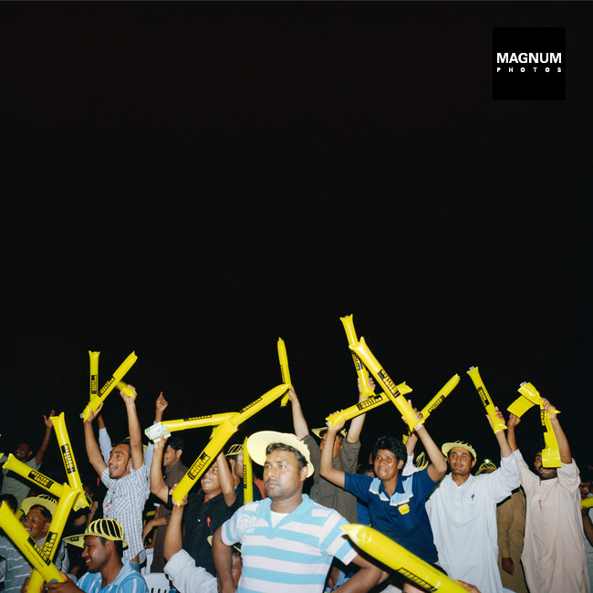 U.A.E. Dubai. 'Champ ka Camp' singing competition in the labour camp. 2013 ©Olivia Arthur / Magnum Photos