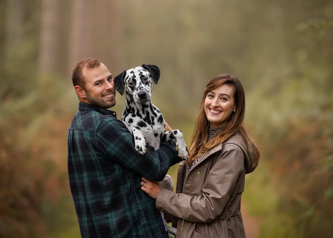Dalmatian and her family, enjoying a natural outdoor portrait session in Petersfield, Hampshire, by Clara Allansson Photography, capturing their personality and character.
