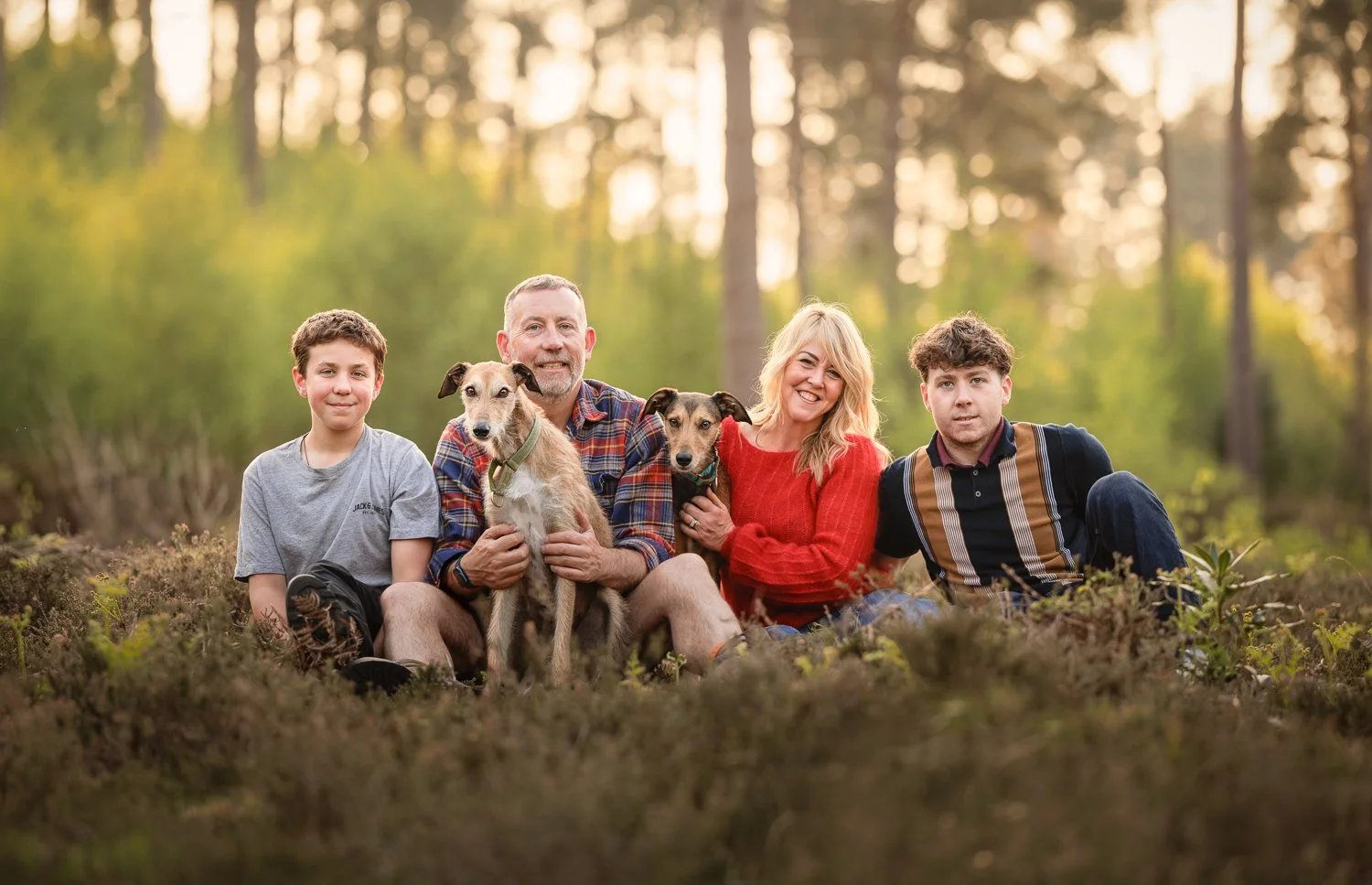 Photograph of a family and their two dogs in West Sussex